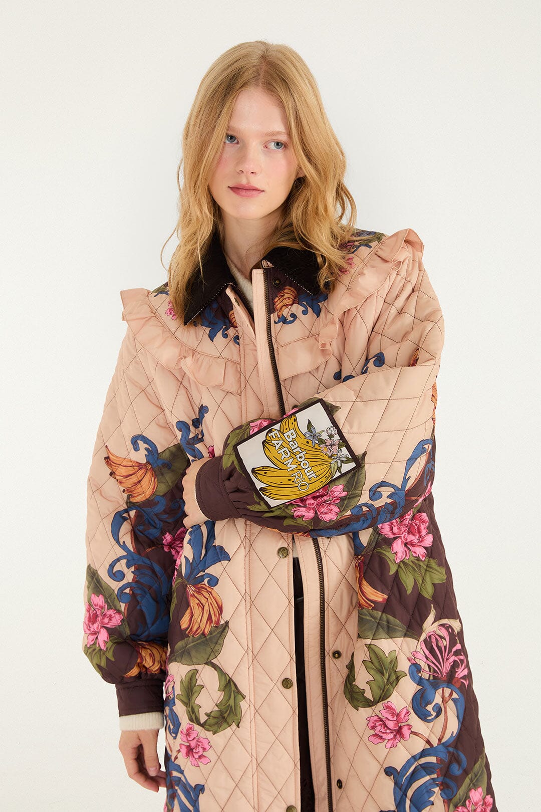 FARM Rio model wearing the Bloom In Between Quilted Midi Coat