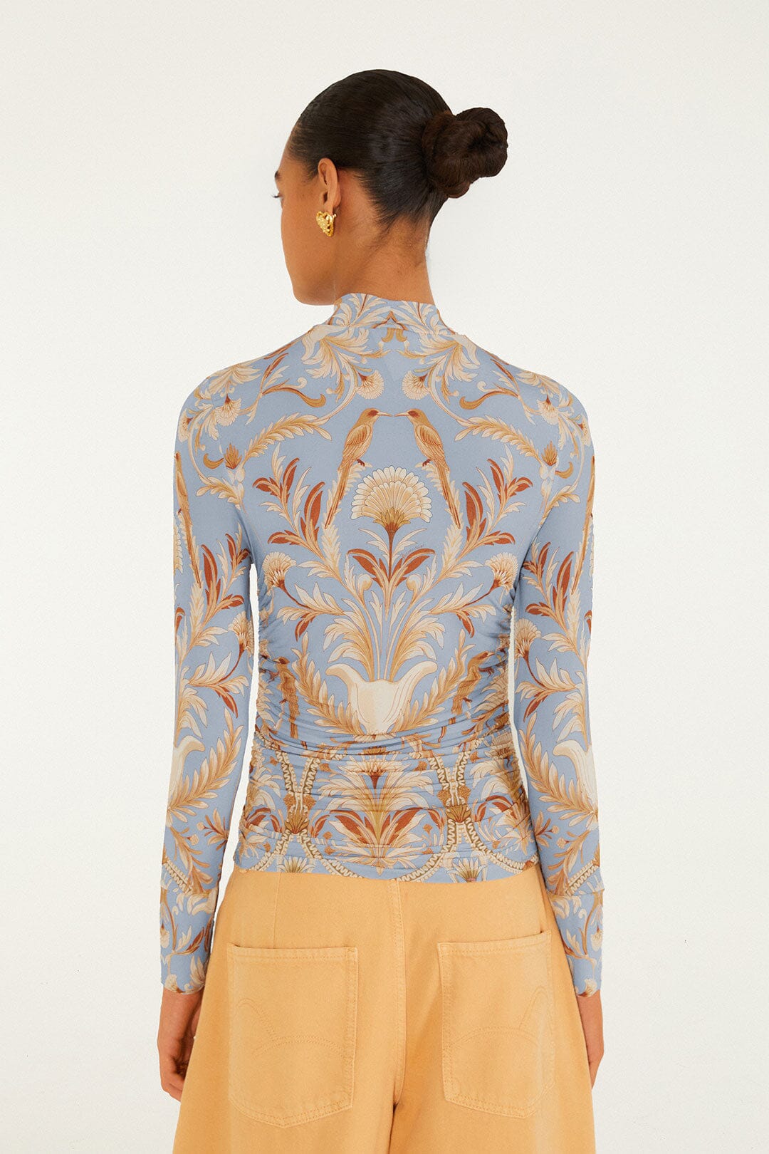 FARM Rio model wearing the Blooming Garden Jersey Blouse