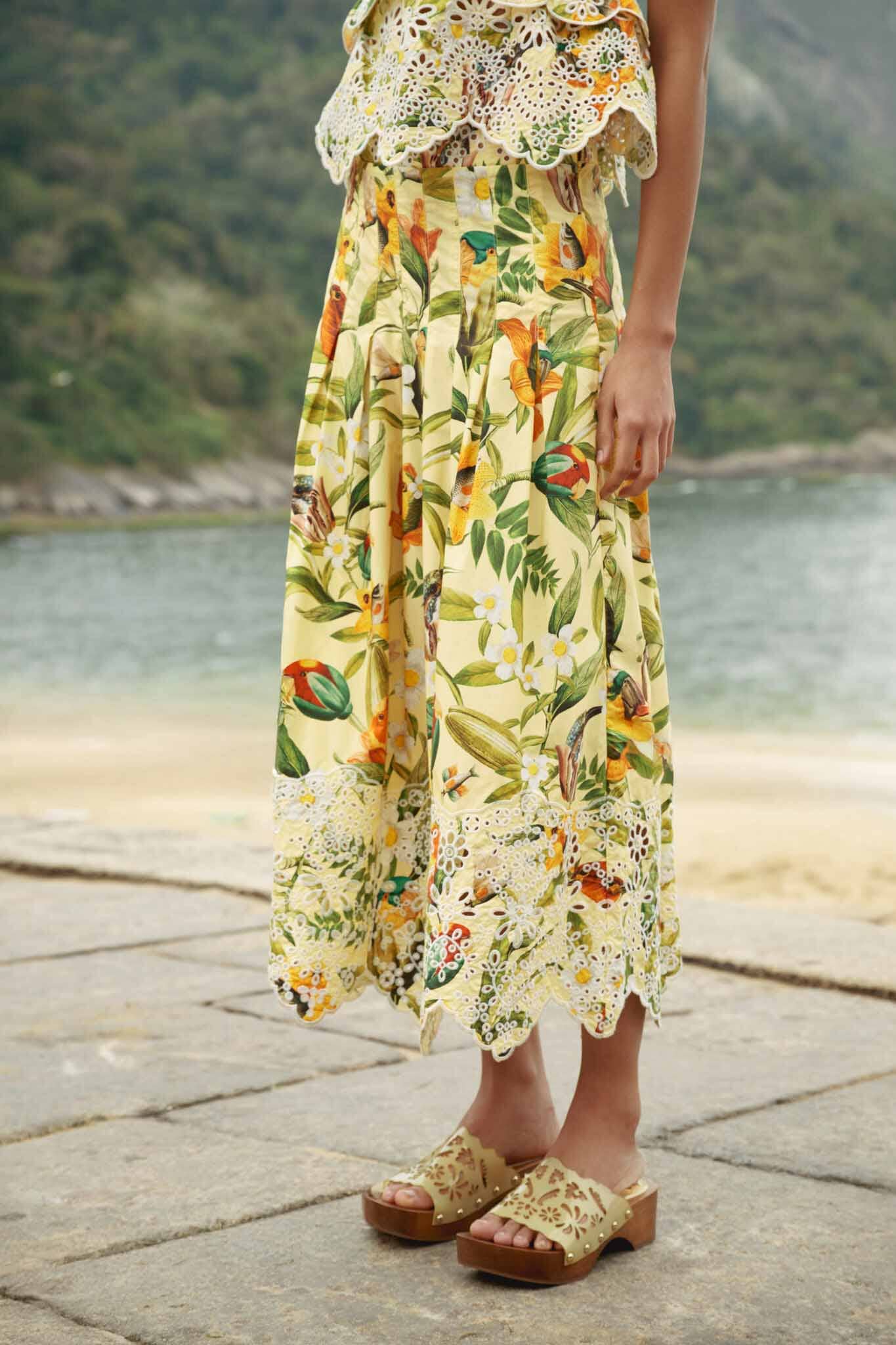 FARM Rio model wearing the Brasil Collage Soft Yellow Maxi Skirt