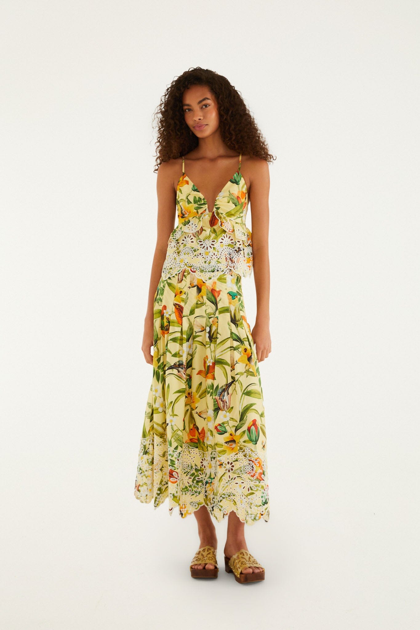 FARM Rio model wearing the Brasil Collage Soft Yellow Maxi Skirt