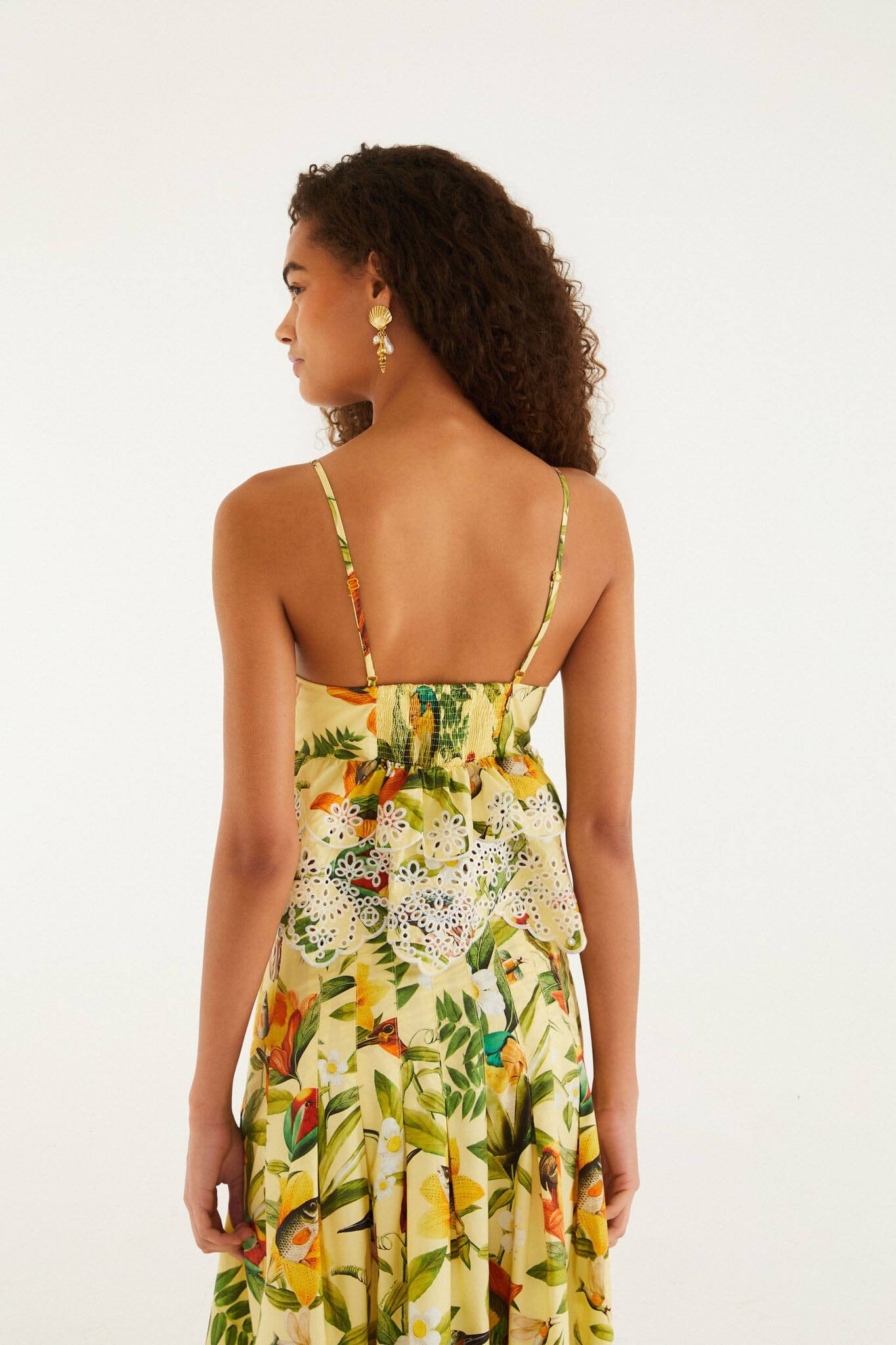 FARM Rio model wearing the Brasil Collage Soft Yellow Ruffles Sleeveless Blou