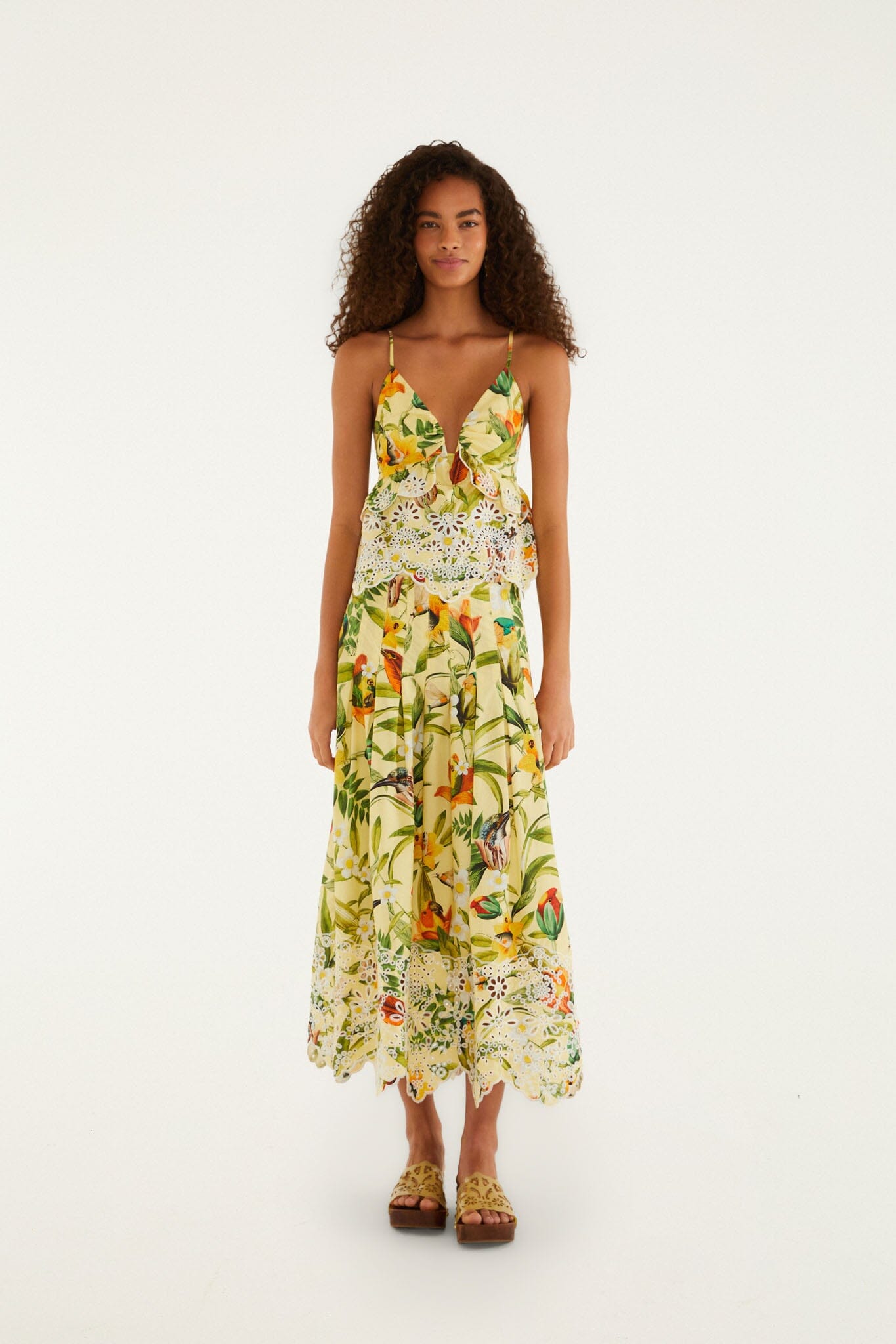 FARM Rio model wearing the Brasil Collage Soft Yellow Ruffles Sleeveless Blou