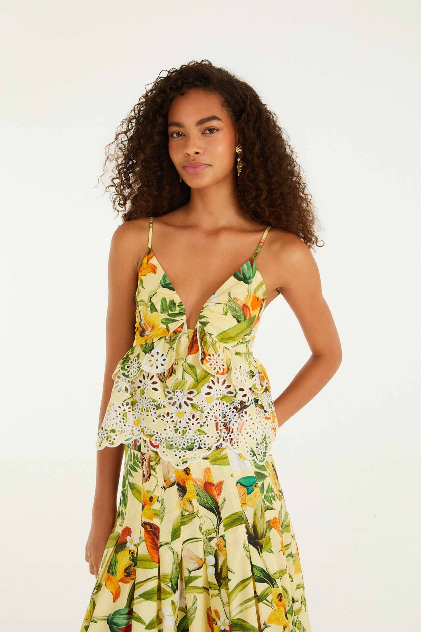 FARM Rio model wearing the Brasil Collage Soft Yellow Ruffles Sleeveless Blou