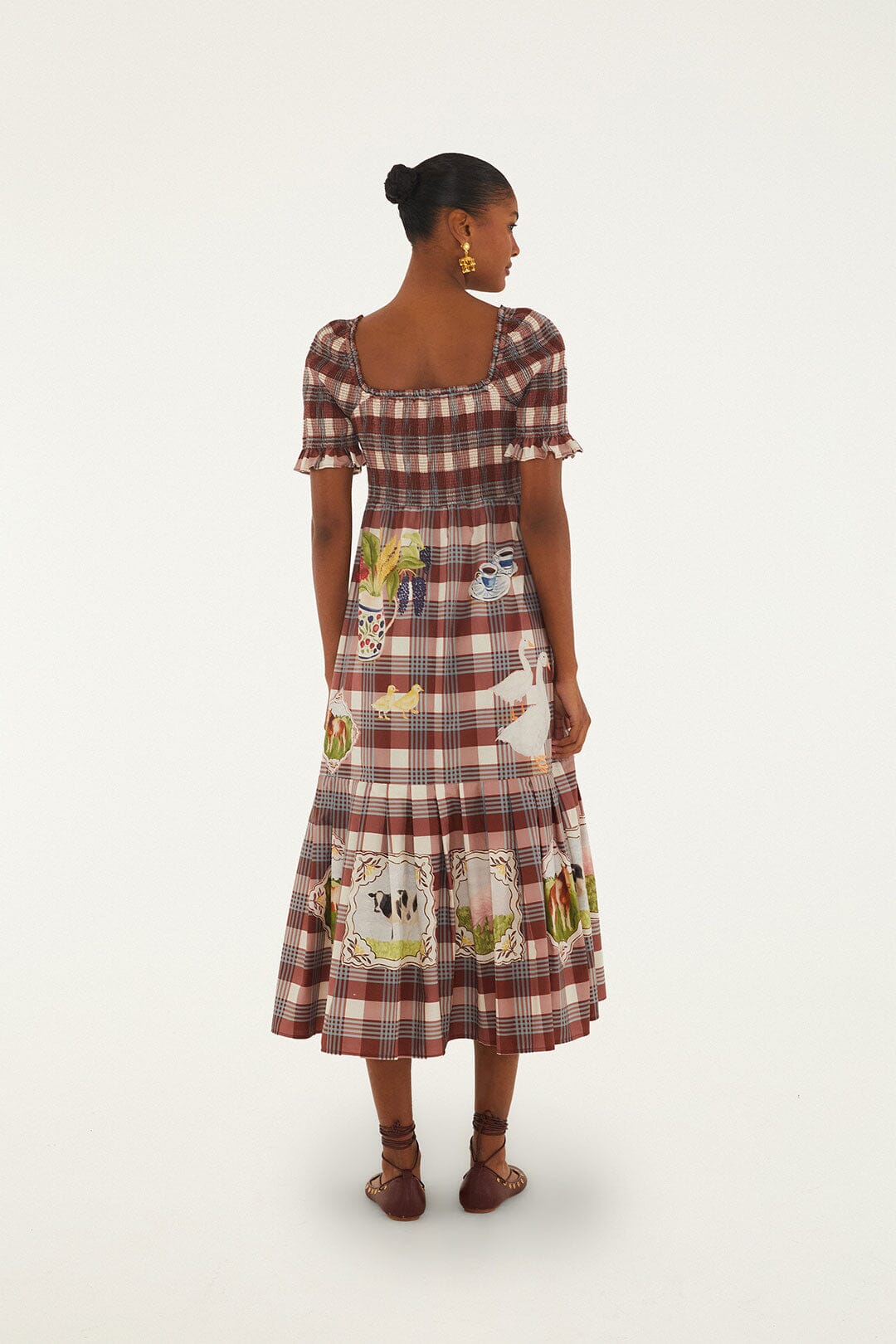 FARM Rio model wearing the Brown Country Table Tartan Smocked Maxi Dress