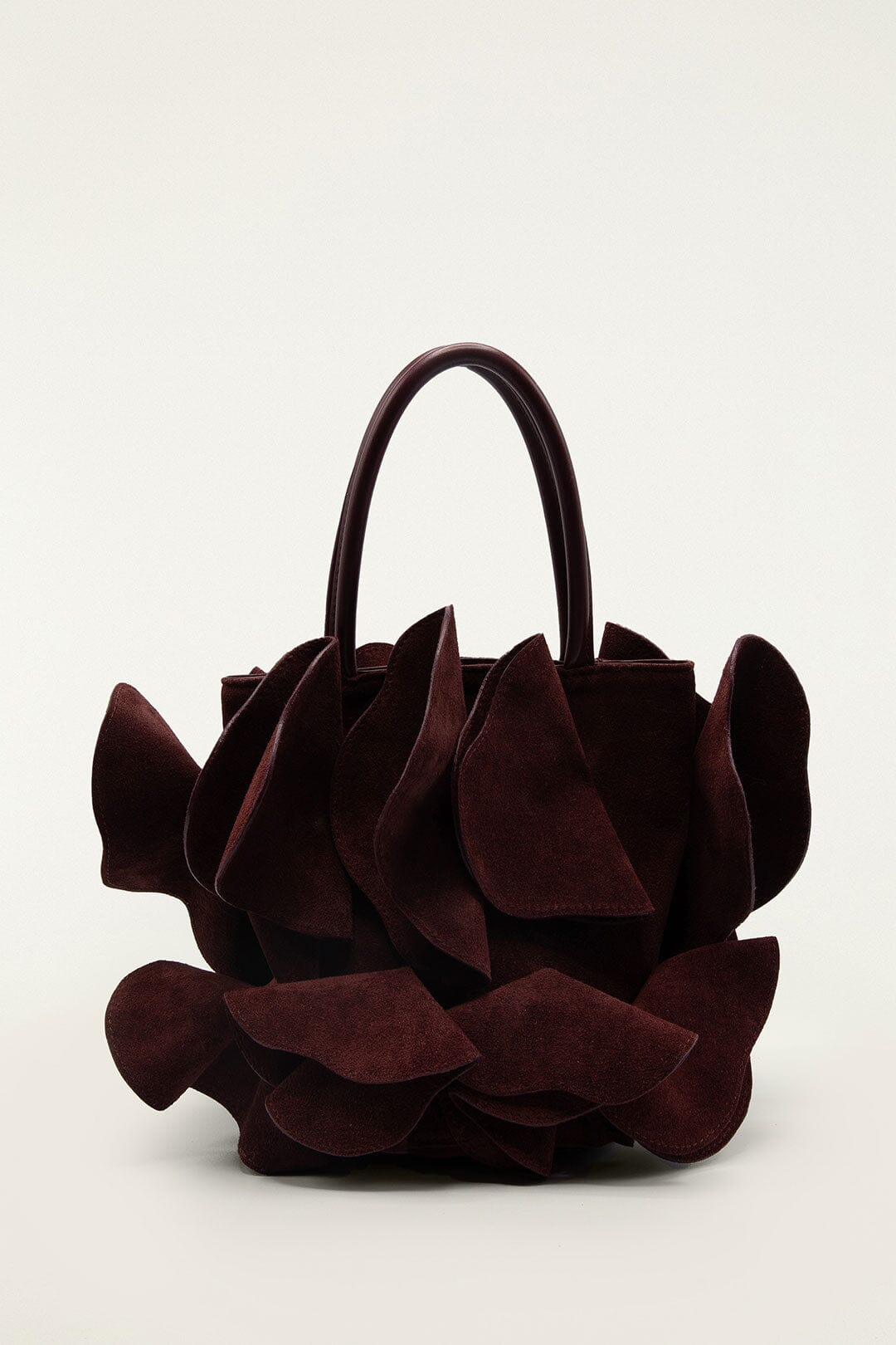 FARM Rio model wearing the Brown Leather Flower Bag