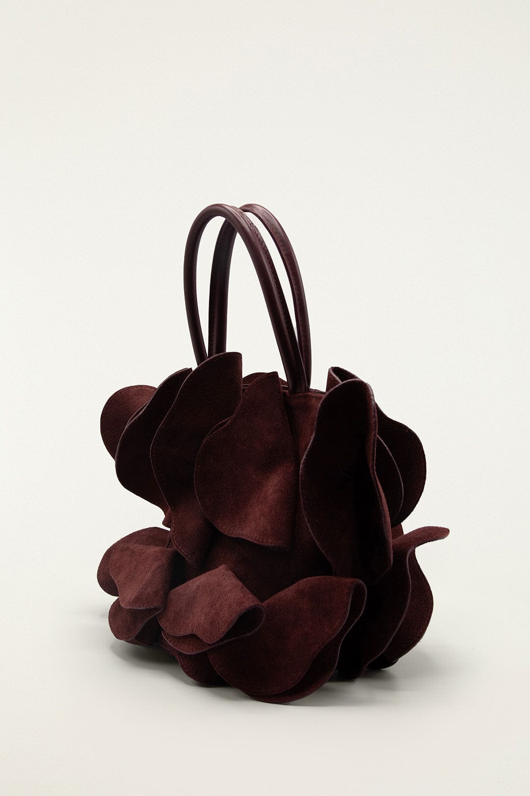 FARM Rio model wearing the Brown Leather Flower Bag
