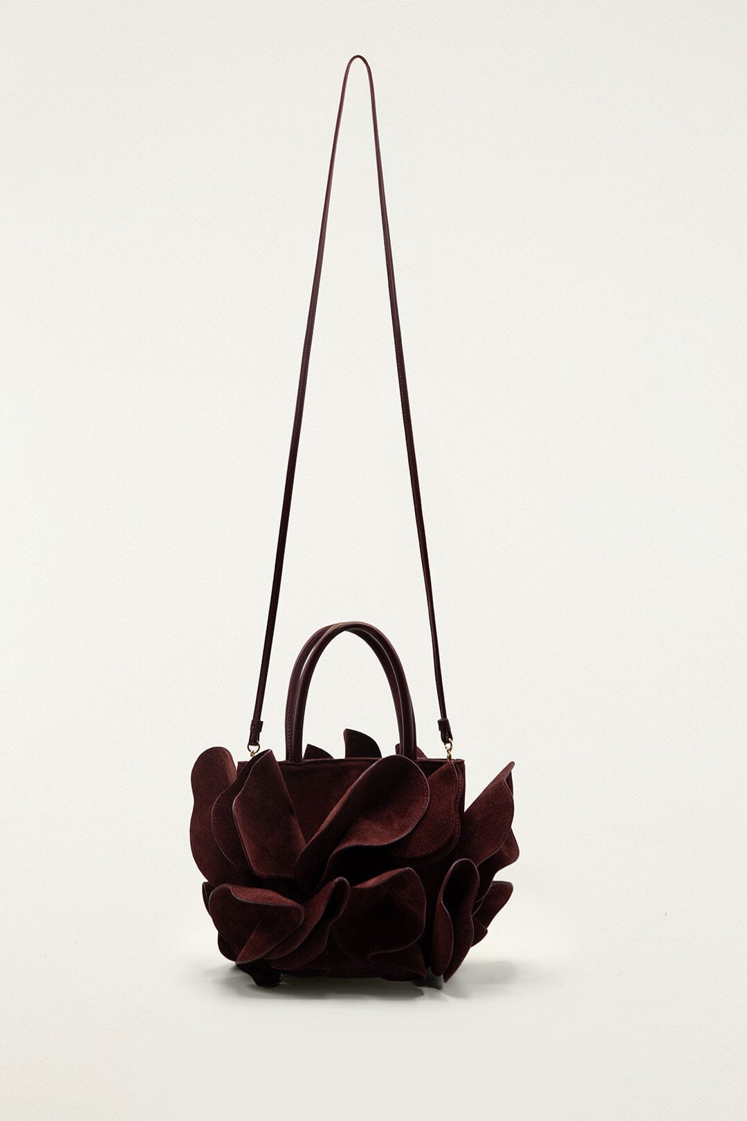 FARM Rio model wearing the Brown Leather Flower Bag