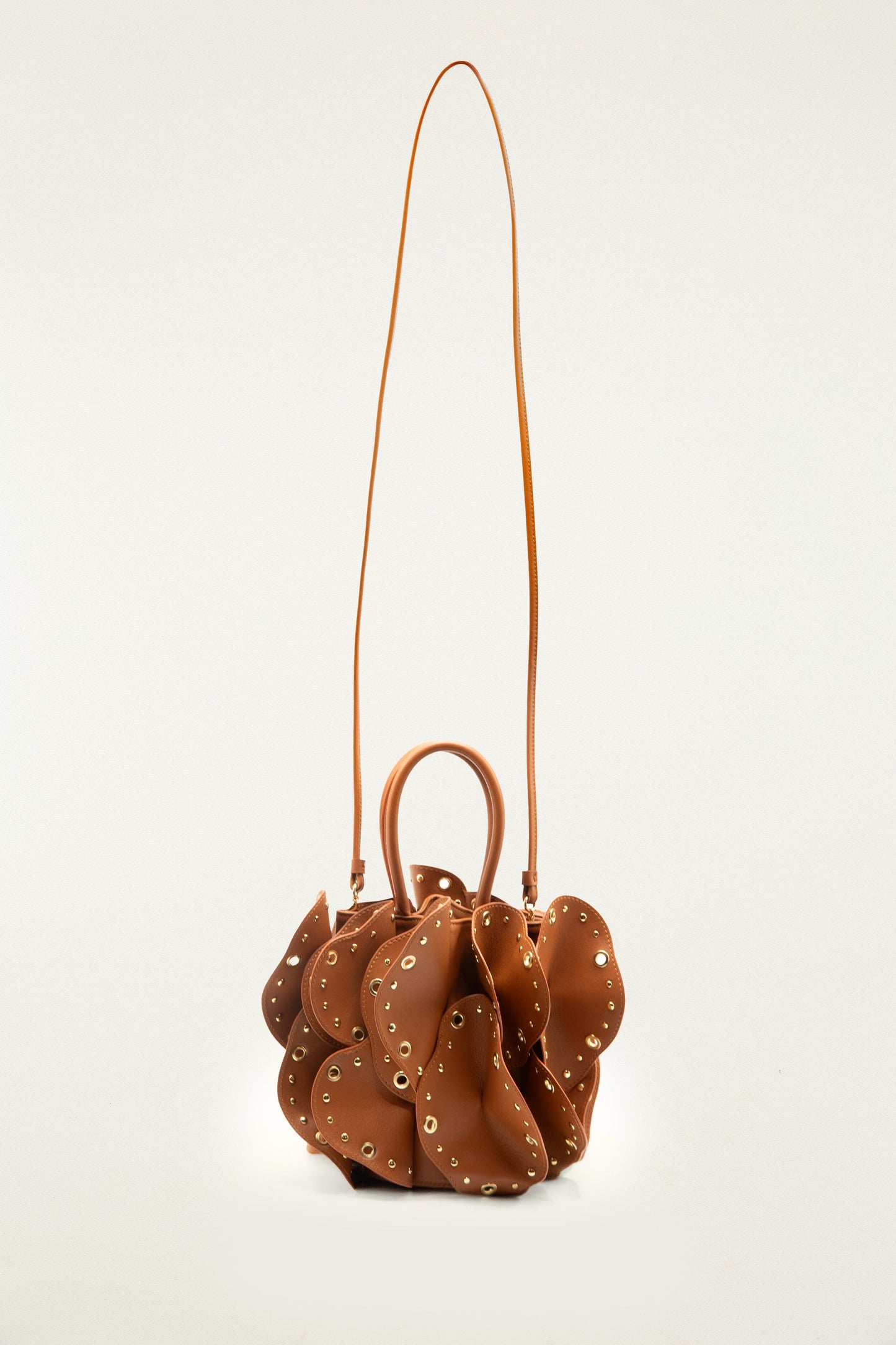 FARM Rio model wearing the Brown Leather Studded Flower Bag