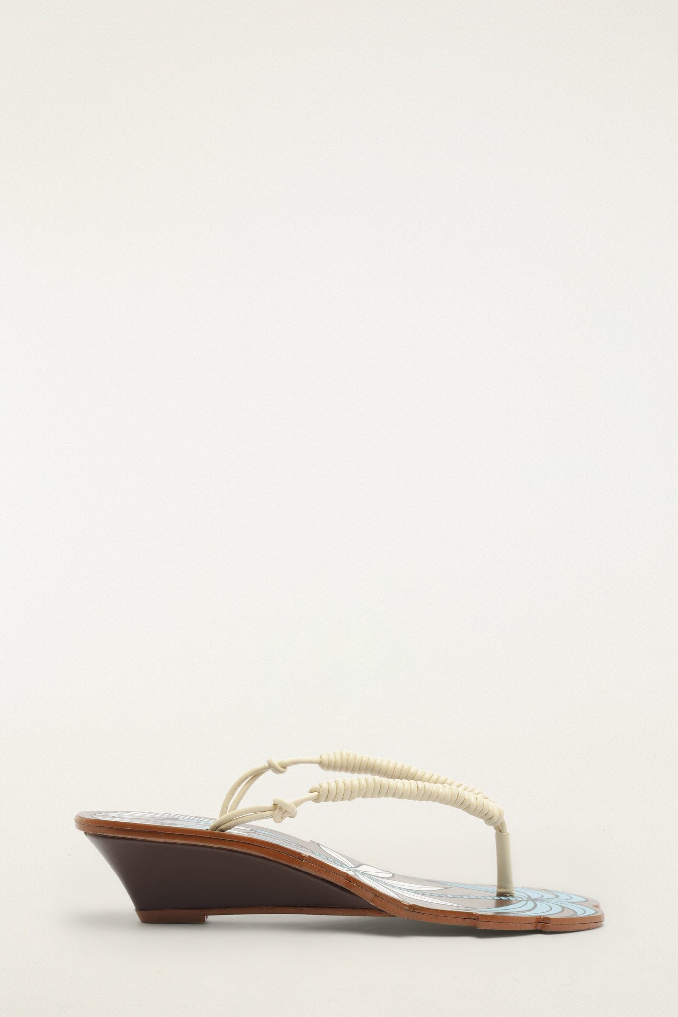 FARM Rio model wearing the Brown Palm Tree Cutwork Wedge Sandal