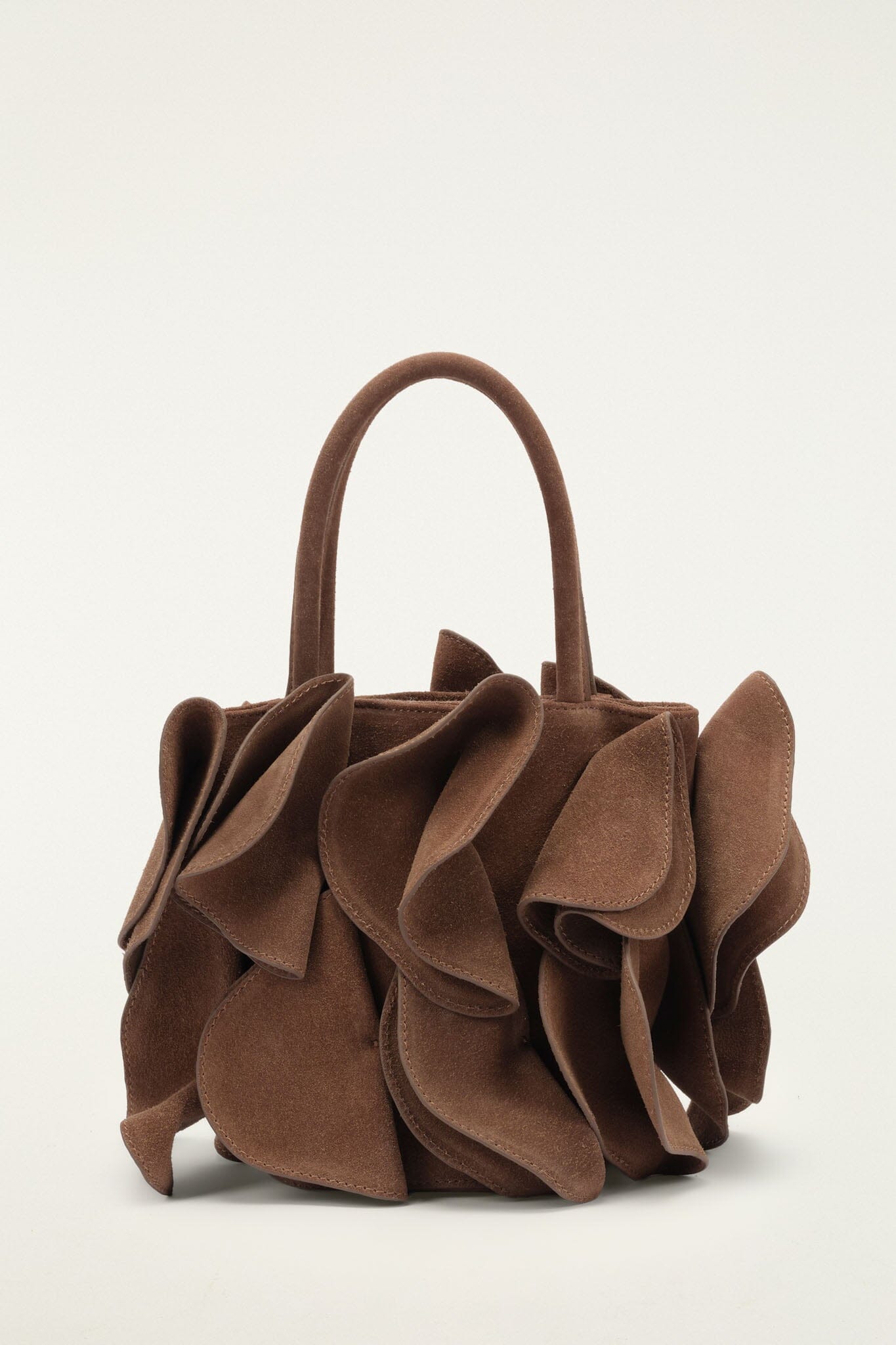 FARM Rio model wearing the Brown Suede Flower Handbag