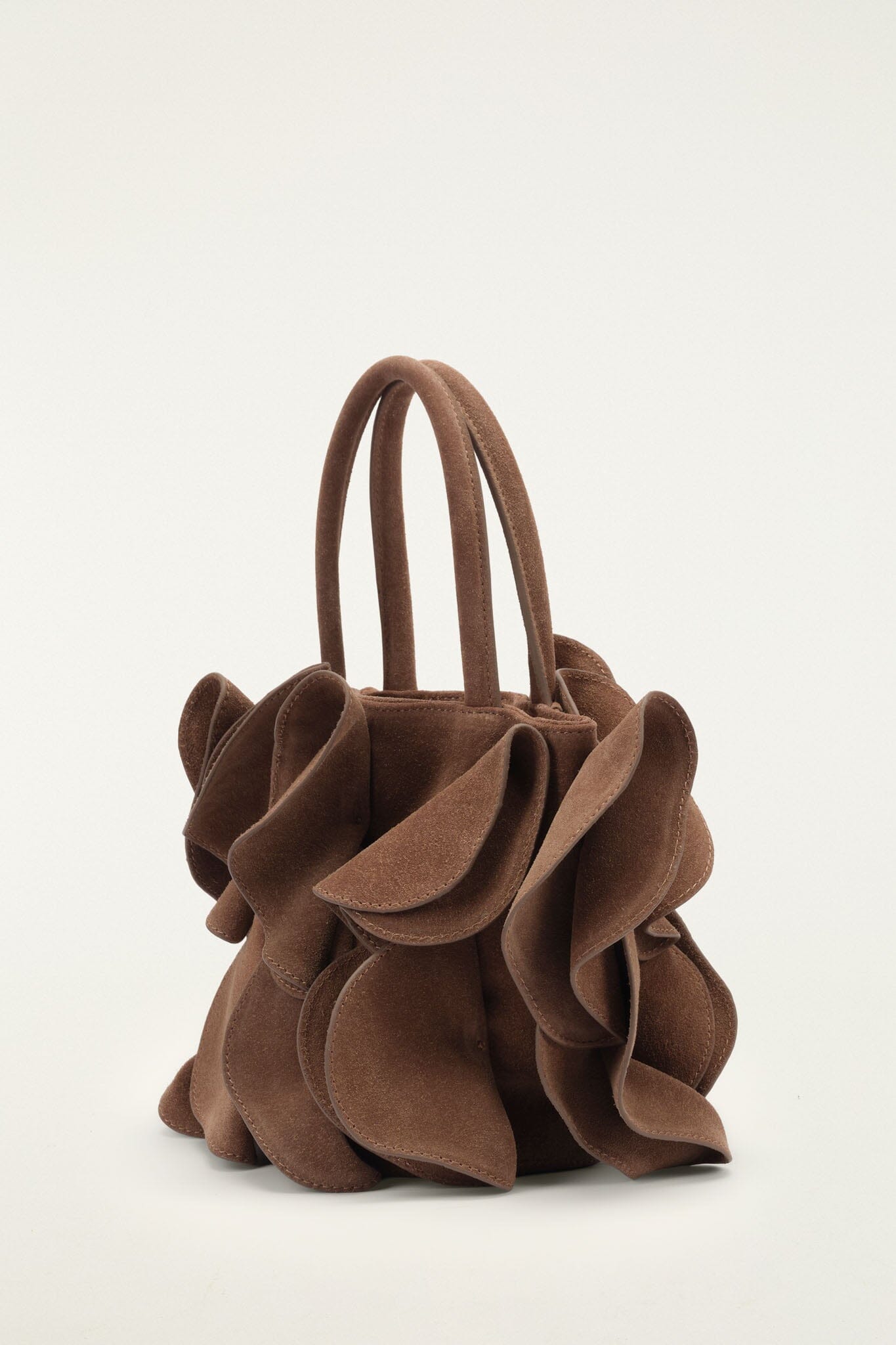FARM Rio model wearing the Brown Suede Flower Handbag