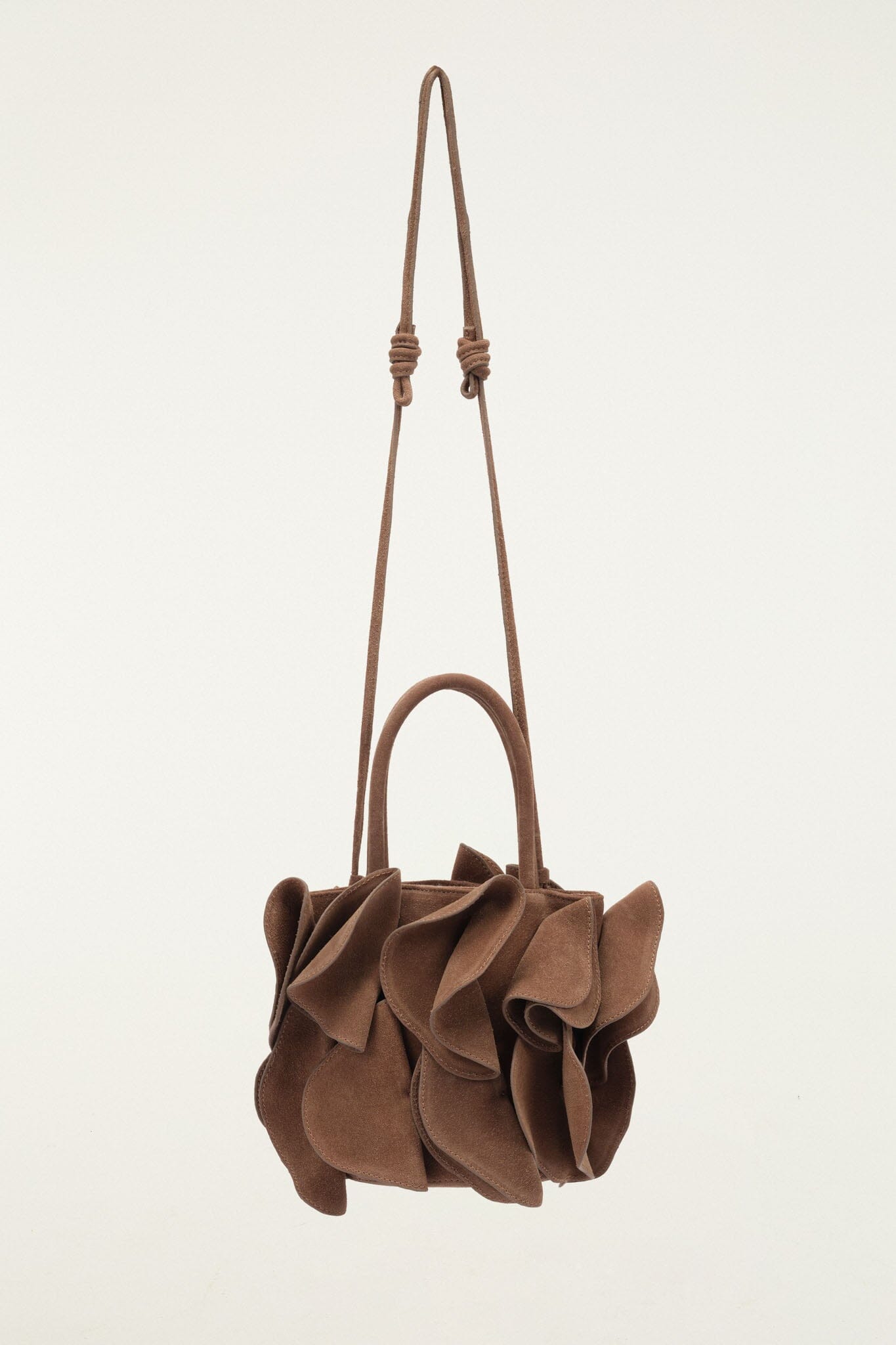 FARM Rio model wearing the Brown Suede Flower Handbag