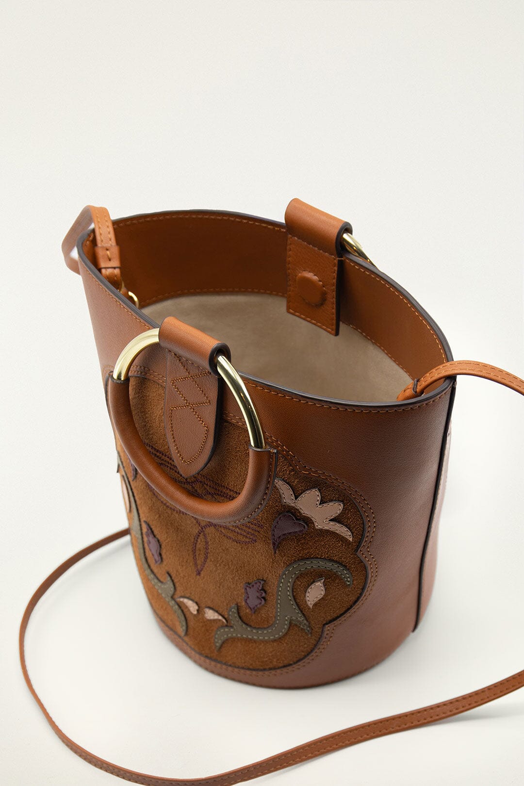 FARM Rio model wearing the Brown Western Embroidered Leather Bucket Bag