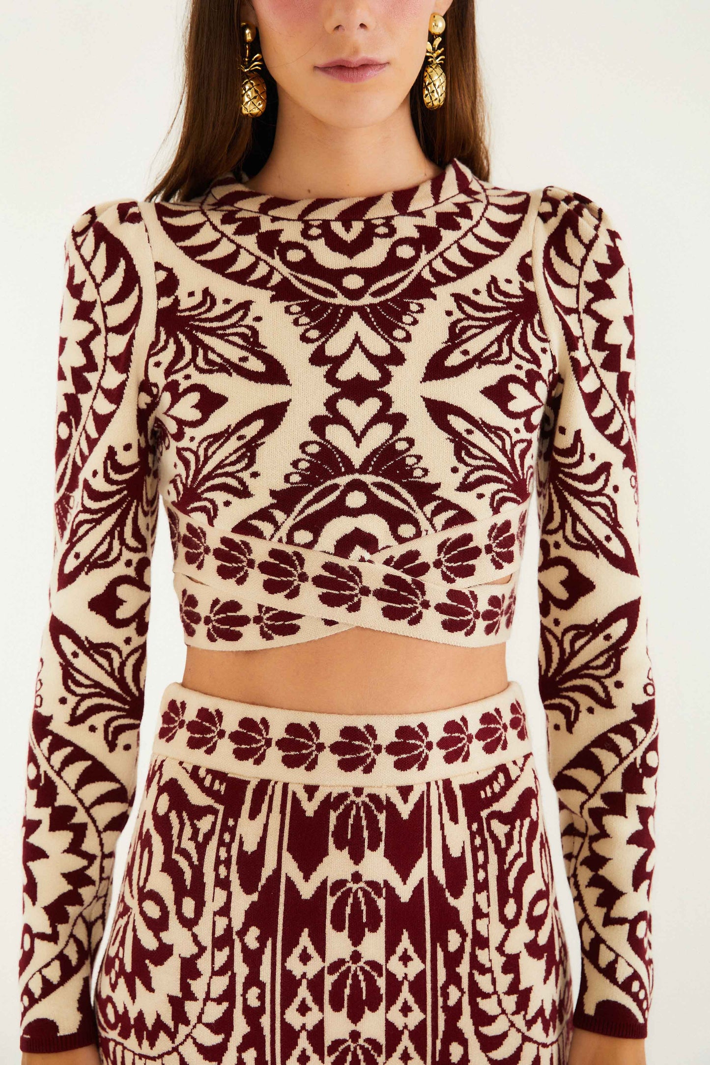 FARM Rio model wearing the Burgundy Pineapple Love Knit Top