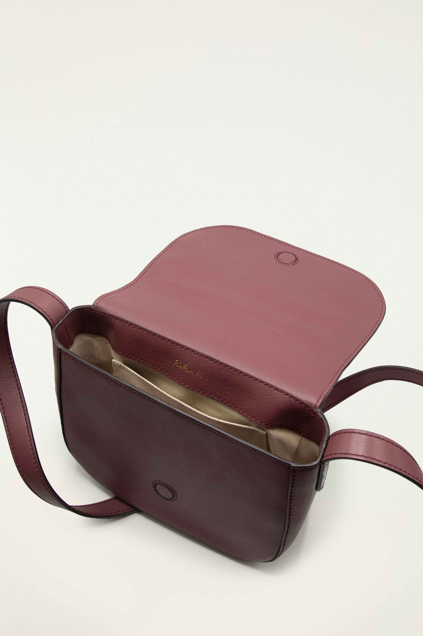 FARM Rio model wearing the Burgundy Western Embroidered Leather Crossbody Bag