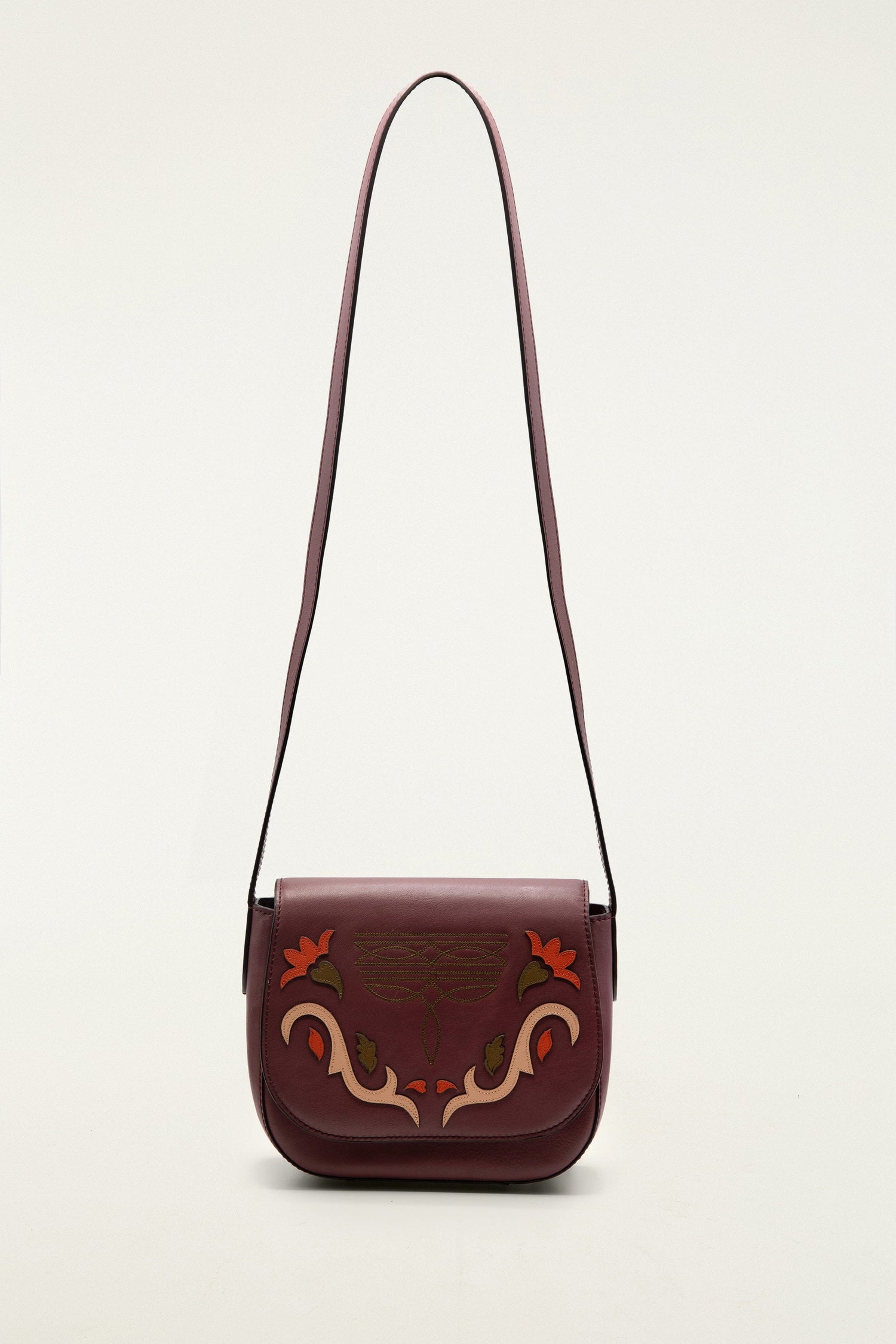FARM Rio model wearing the Burgundy Western Embroidered Leather Crossbody Bag