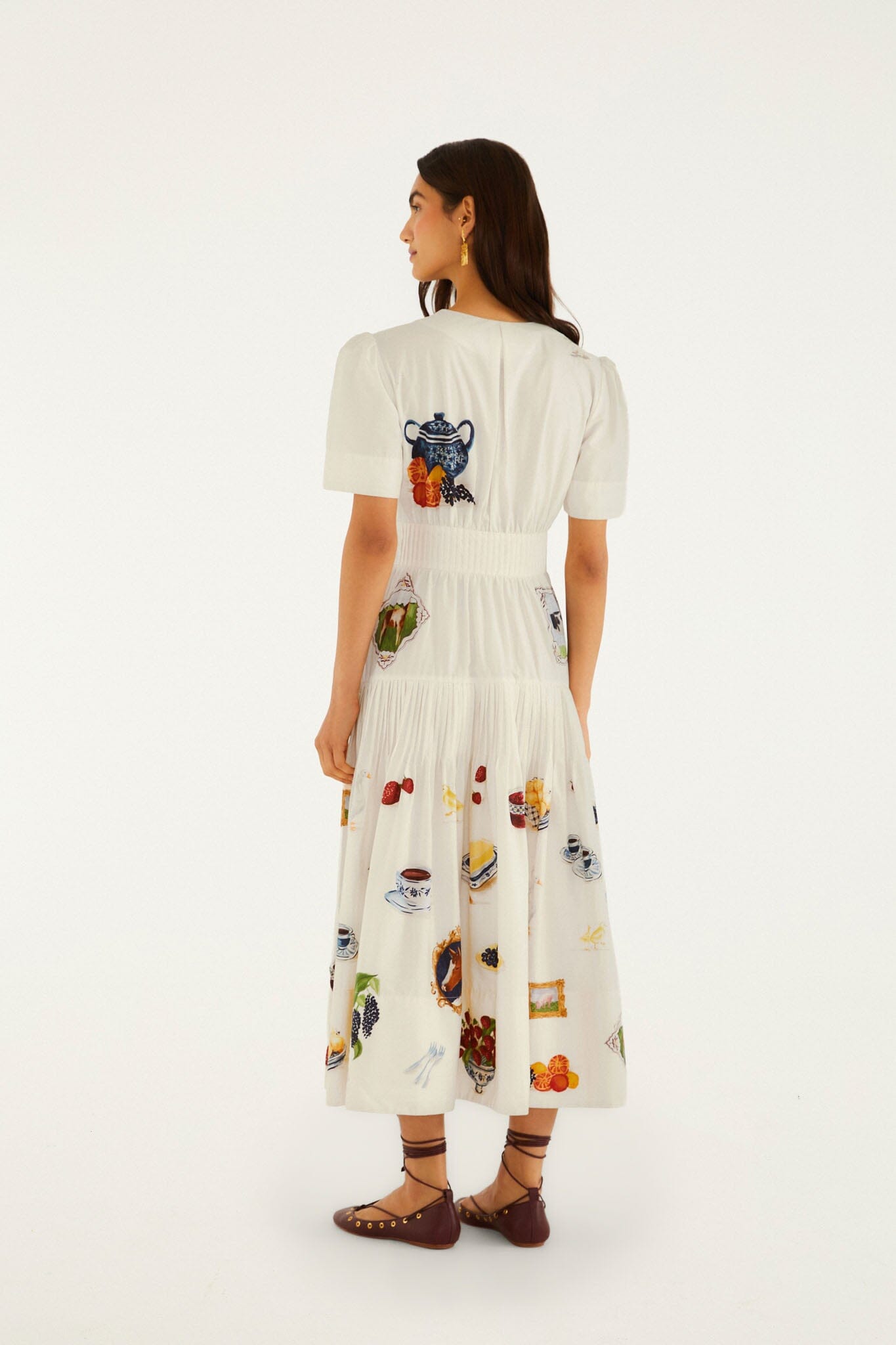 FARM Rio model wearing the Country Table Winter Short Sleeve Midi Dress