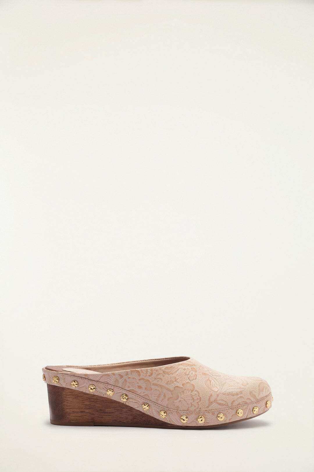 FARM Rio model wearing the Cream Embossed Wedge Clog
