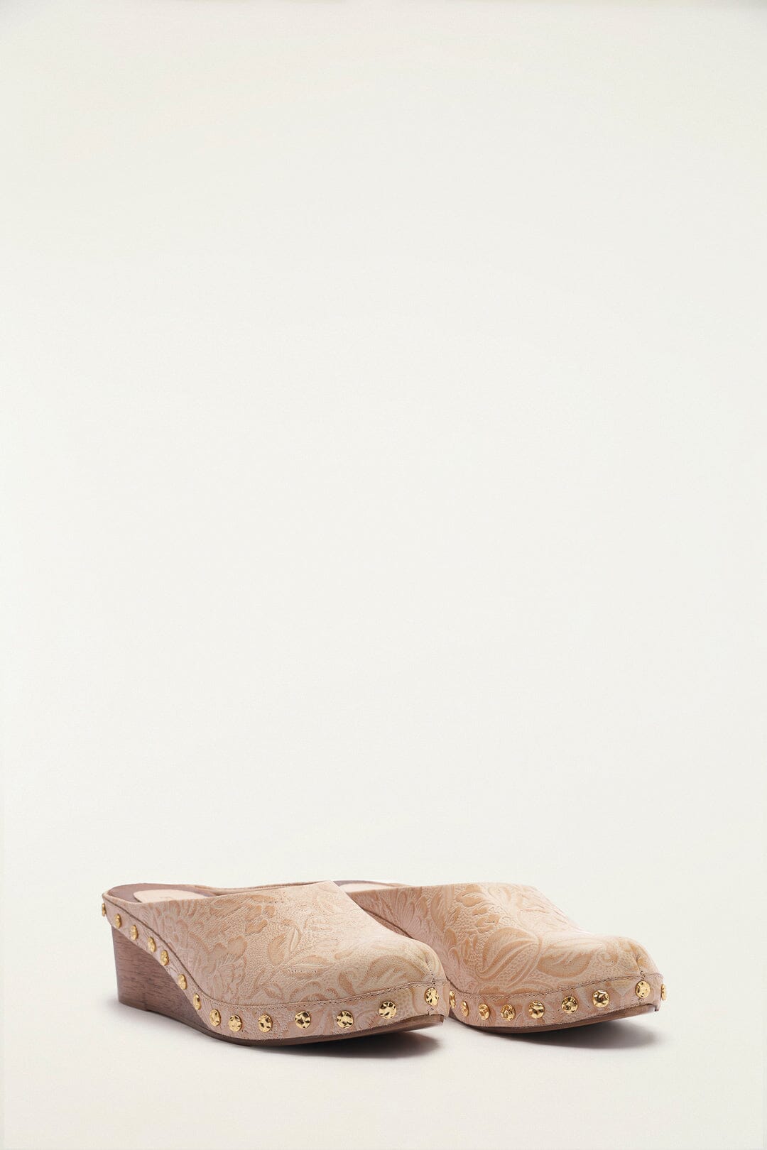 FARM Rio model wearing the Cream Embossed Wedge Clog