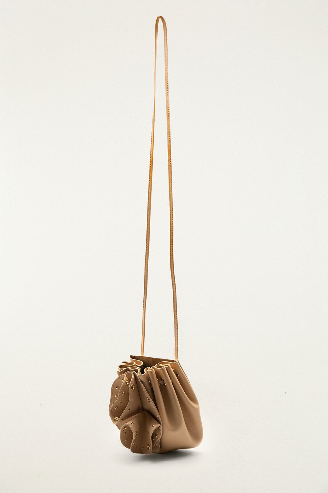 FARM Rio model wearing the Cream Leather Studded Crossbody Flower Bag