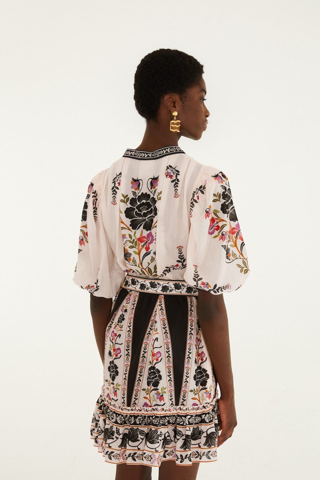 FARM Rio model wearing the Delicate Floral Mini Dress