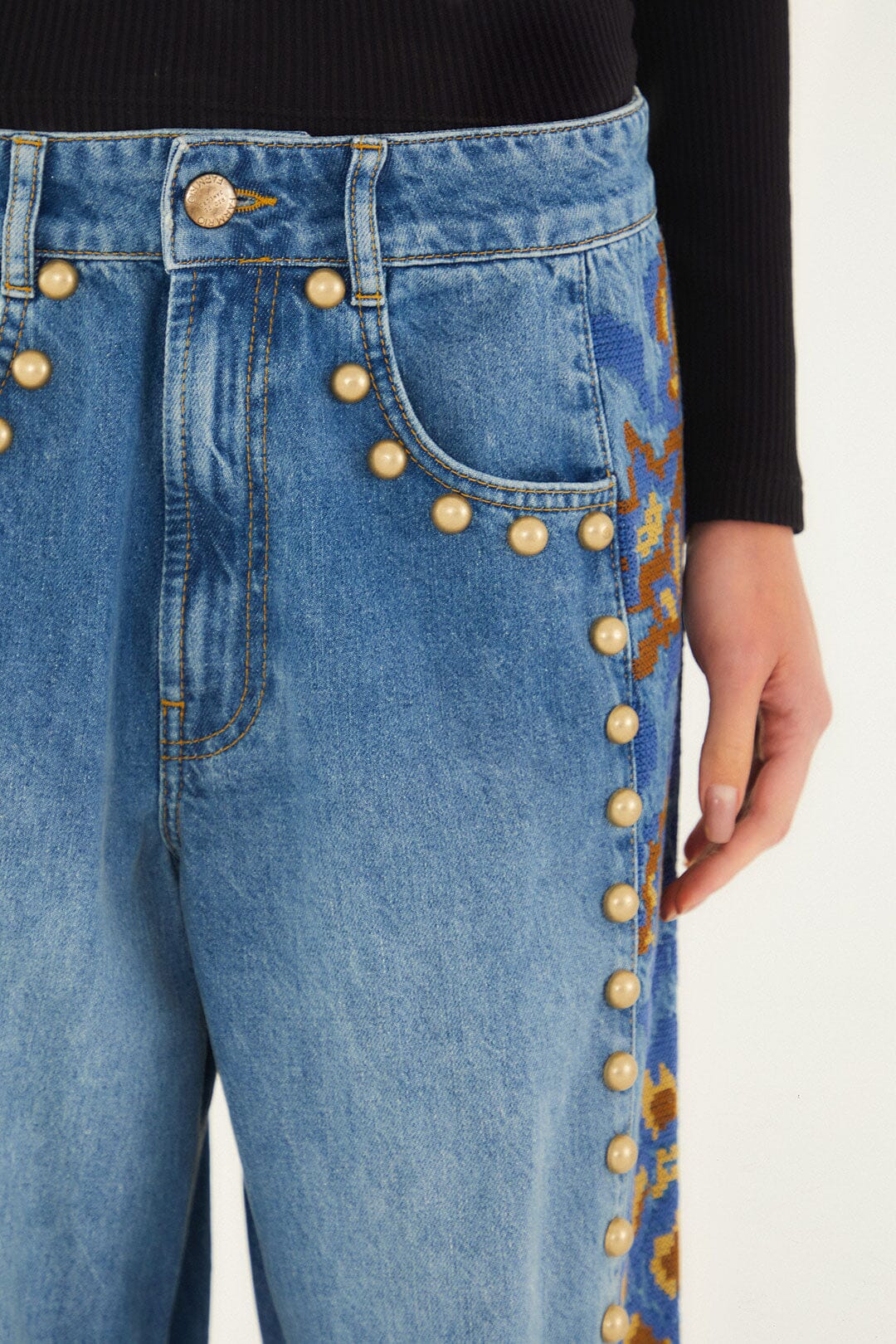 FARM Rio model wearing the Denim Metal Details Embroidered High Waist Pants