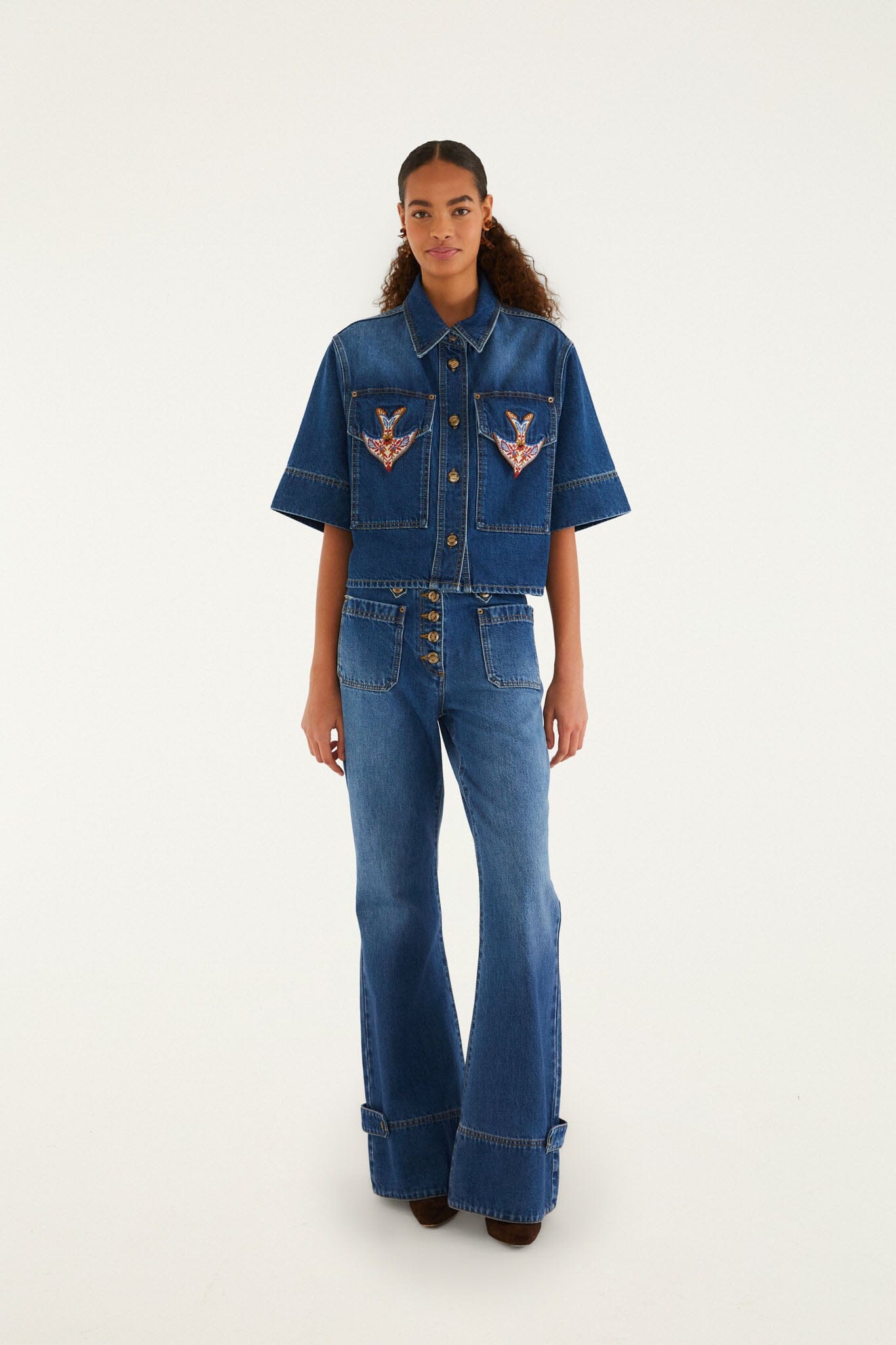 FARM Rio model wearing the Denim Porcelain Birds Pockets Flare Pants
