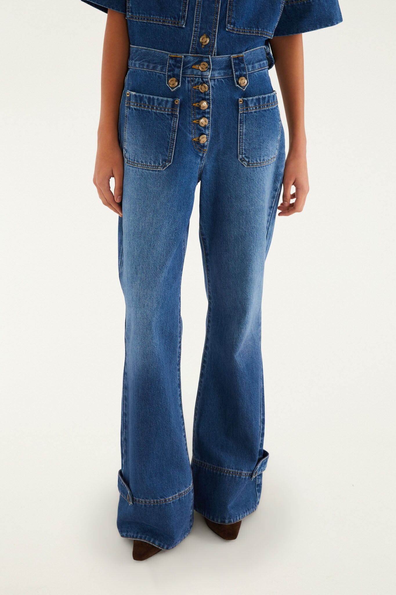 FARM Rio model wearing the Denim Porcelain Birds Pockets Flare Pants