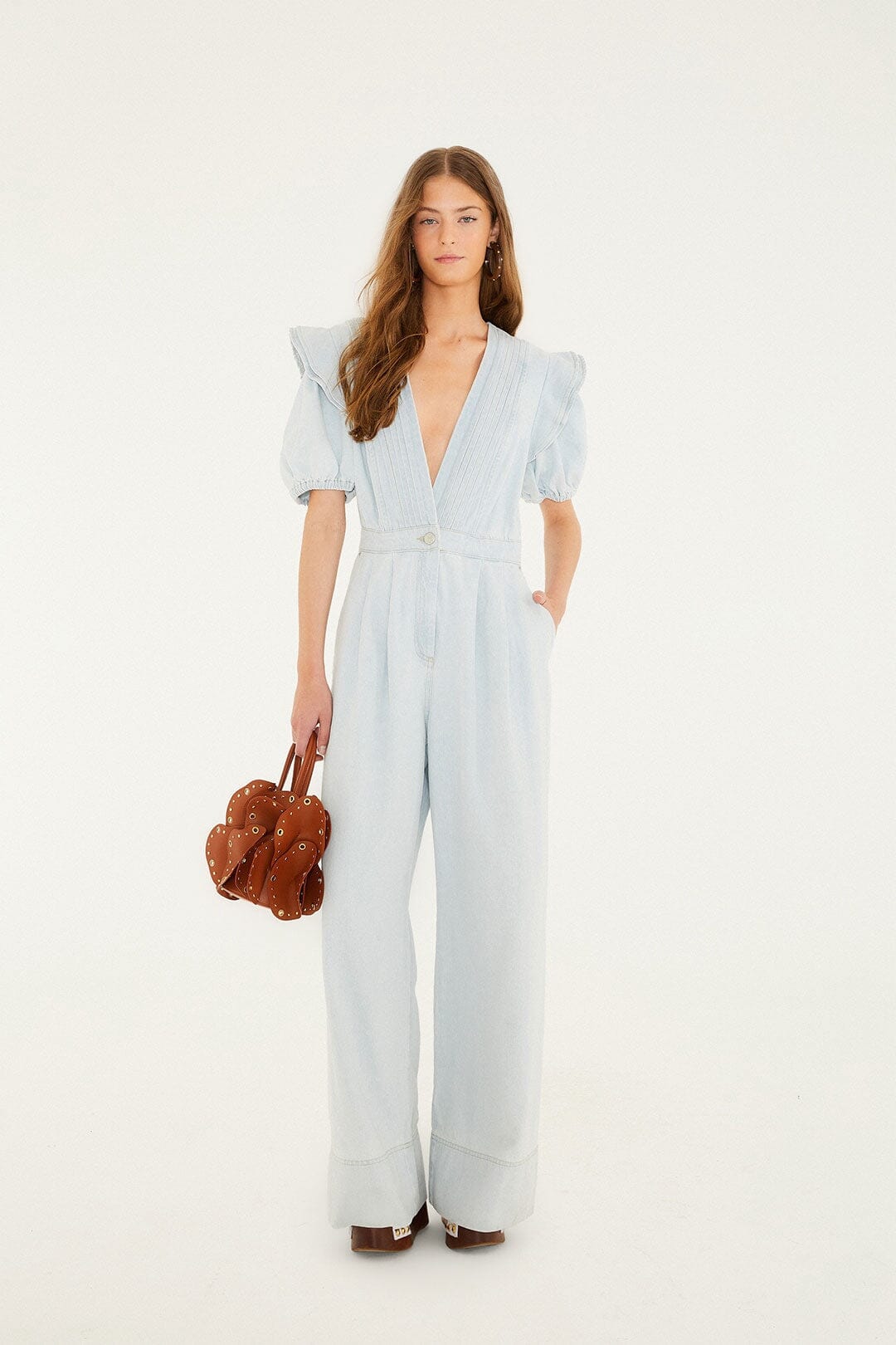 FARM Rio model wearing the Denim V Neck Pleated Ruffled Jumpsuit
