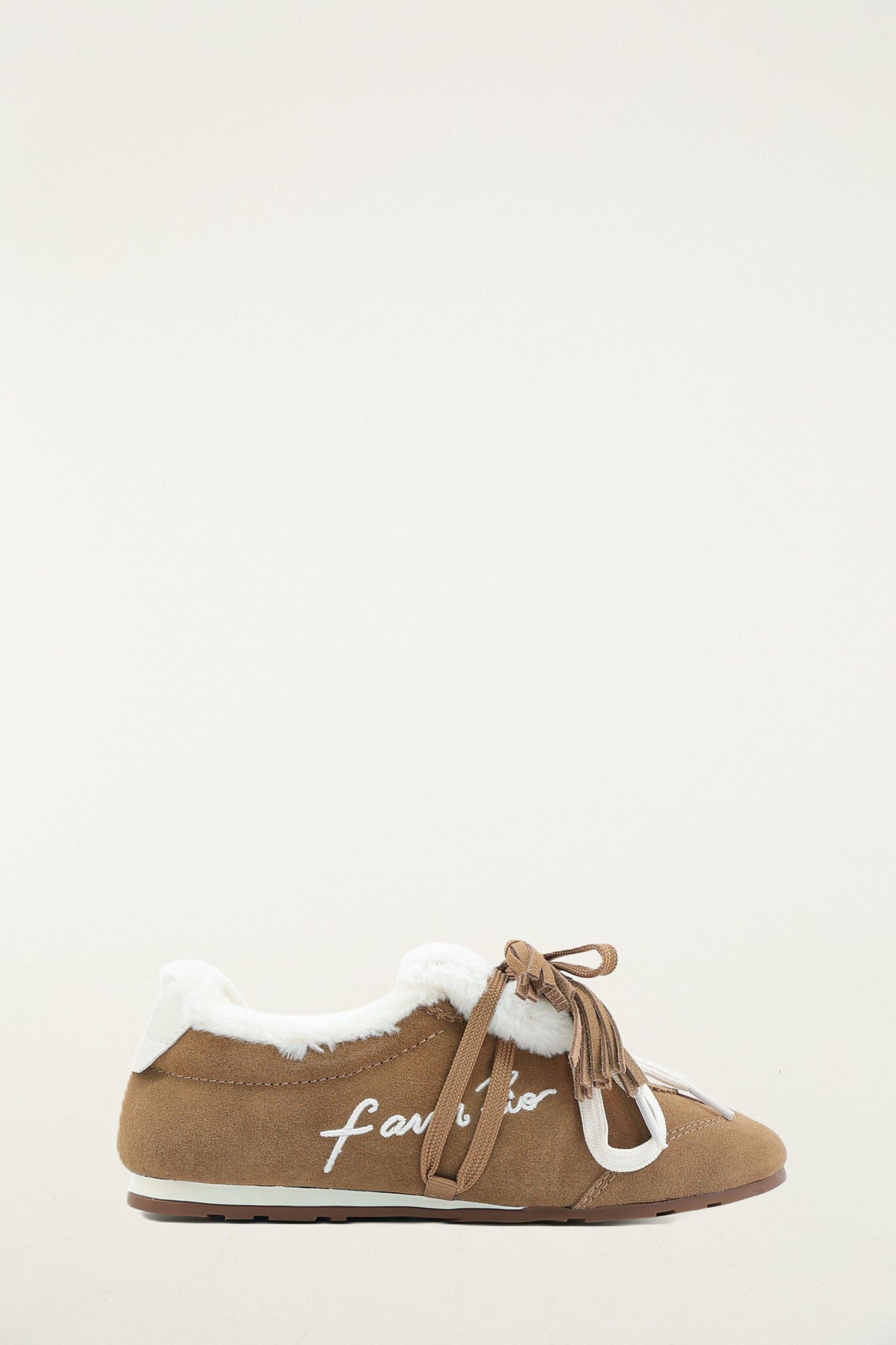 FARM Rio model wearing the Farm Shearling Sneakerina