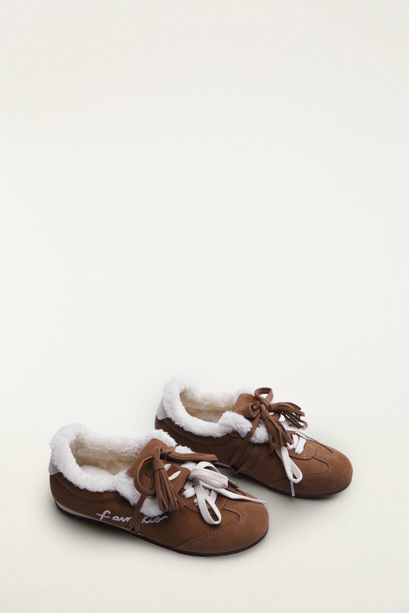 FARM Rio model wearing the Farm Shearling Sneakerina
