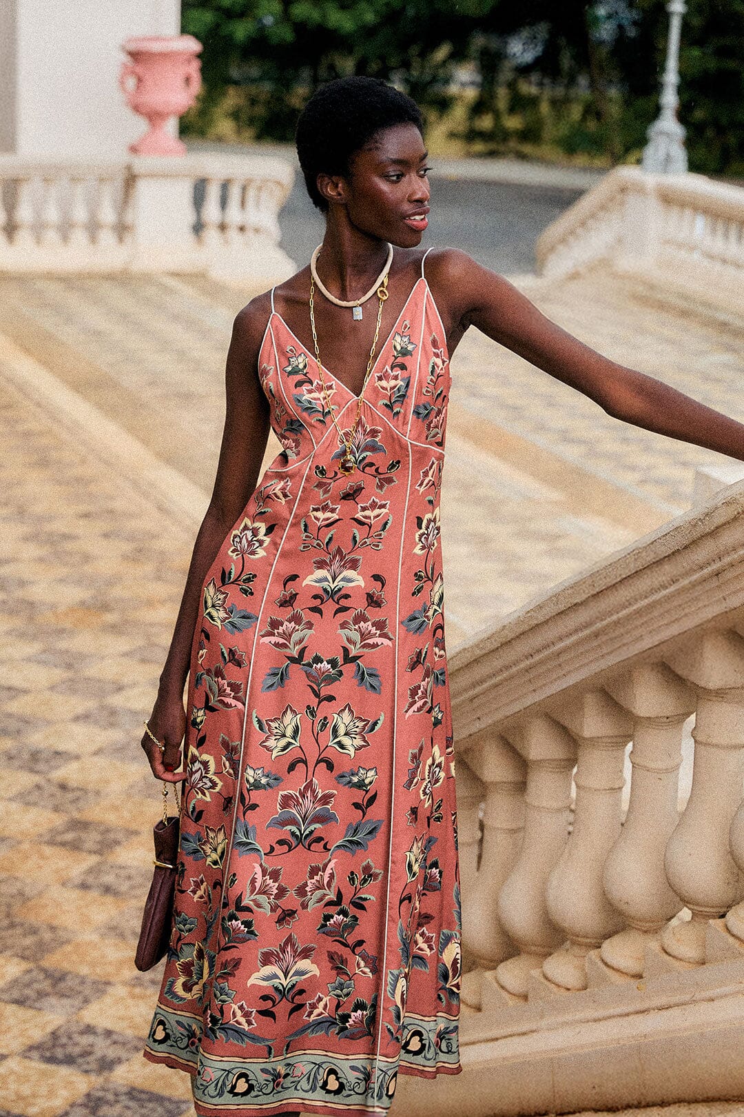 FARM Rio model wearing the Floral Beauty Tapestry Maxi Slip Dress