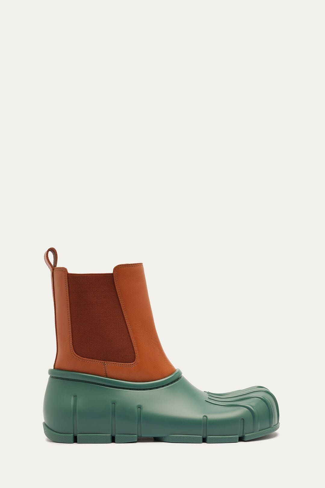 FARM Rio model wearing the Forest Green Monstera Rain Chelsea Boot