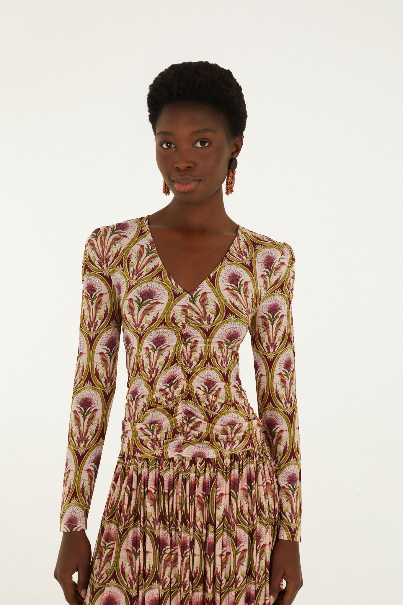 FARM Rio model wearing the Garden Medal Jersey Long Sleeve Blouse