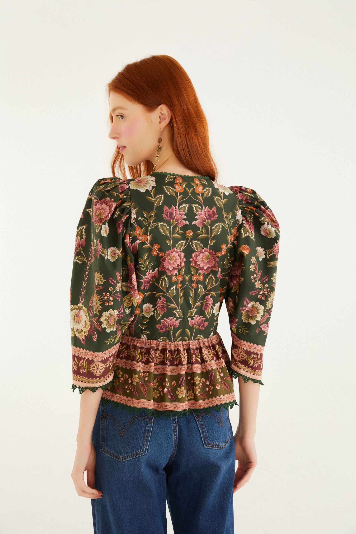 FARM Rio model wearing the Green Flowering Garden Tree Blouse