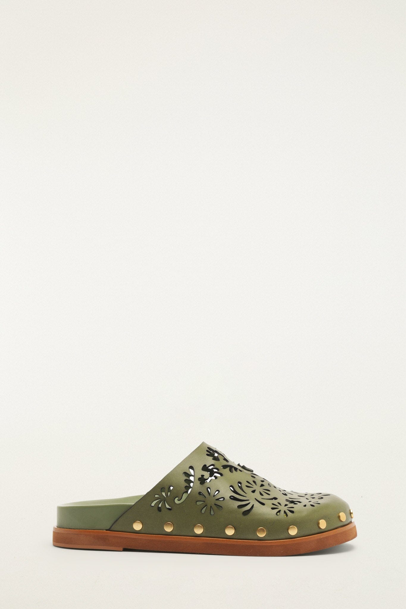 FARM Rio model wearing the Green Lace Leather Anatomic Slide Mule