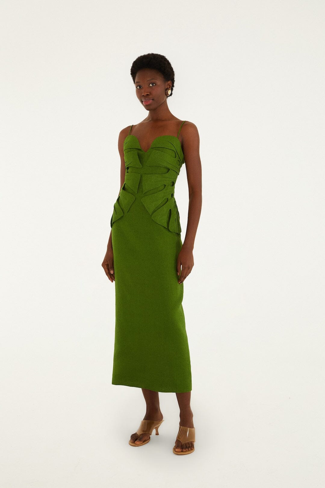 FARM Rio model wearing the Green Monstera Leaf Sleeveless Euroflax Premium Linen Maxi Dress