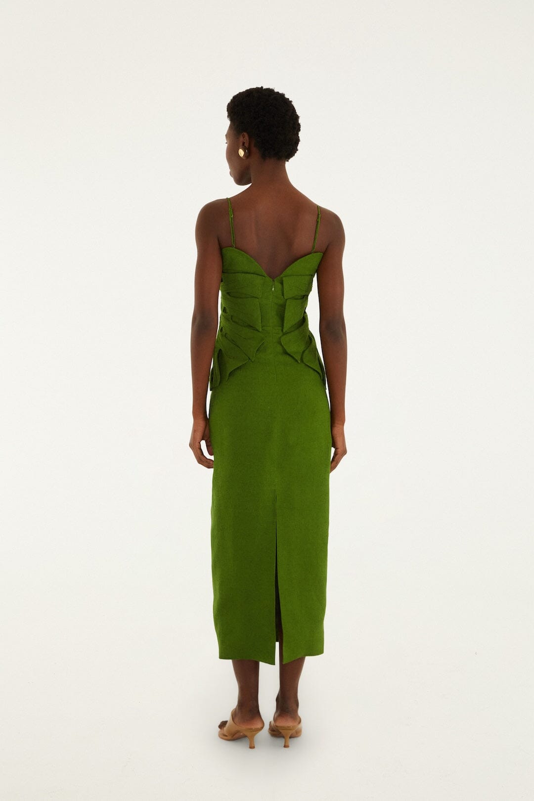FARM Rio model wearing the Green Monstera Leaf Sleeveless Euroflax Premium Linen Maxi Dress