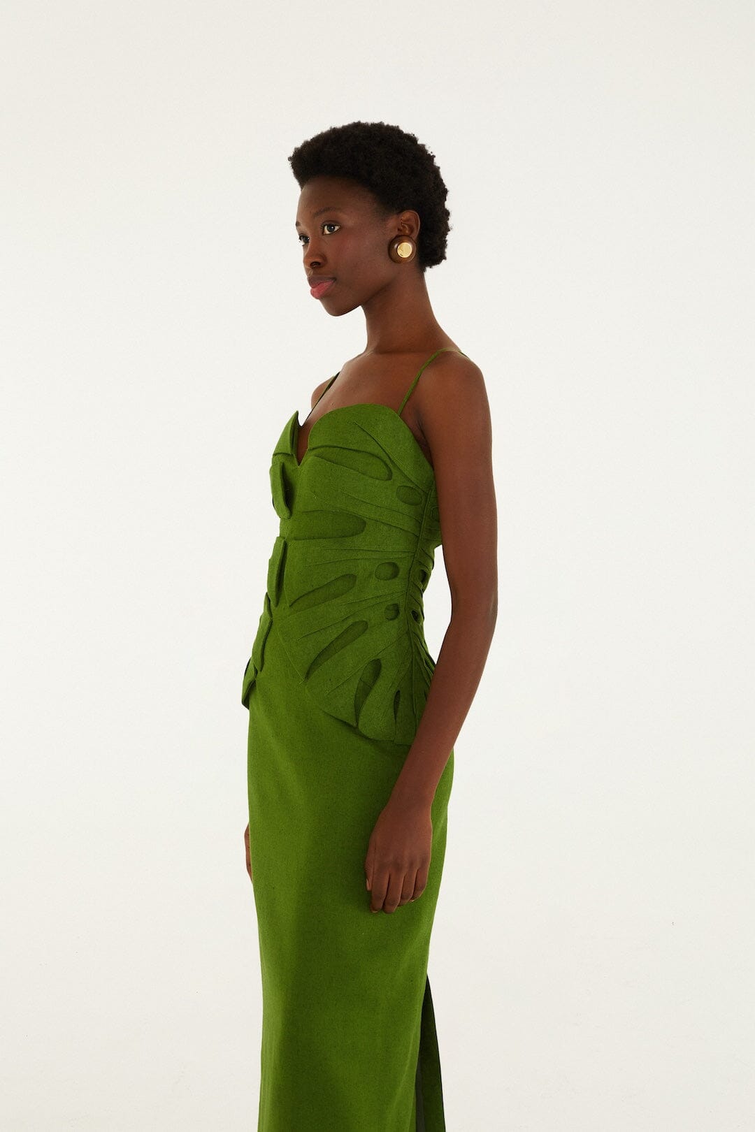 FARM Rio model wearing the Green Monstera Leaf Sleeveless Euroflax Premium Linen Maxi Dress
