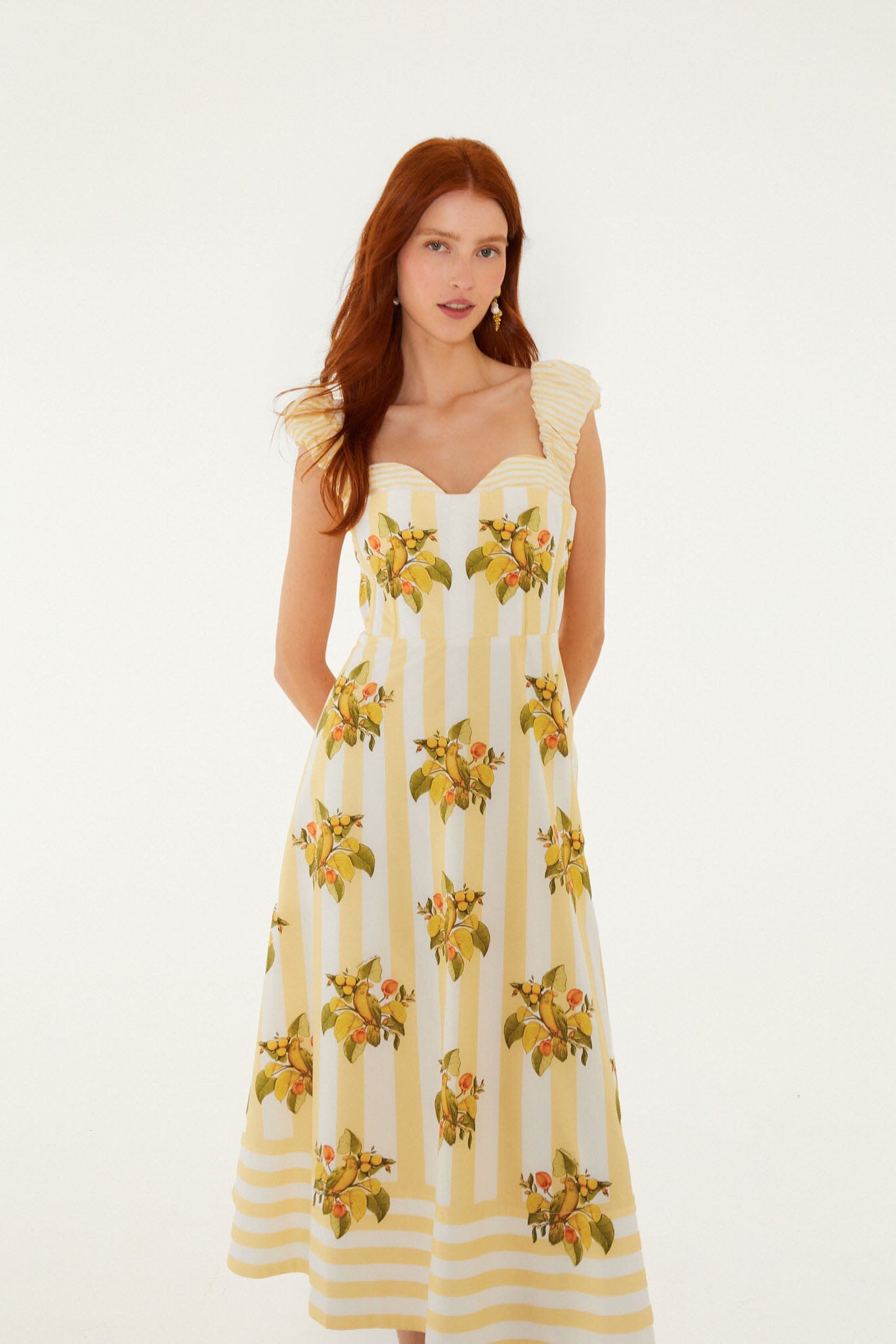 FARM Rio model wearing the Lemon Birds Multicolor Cropped Dress