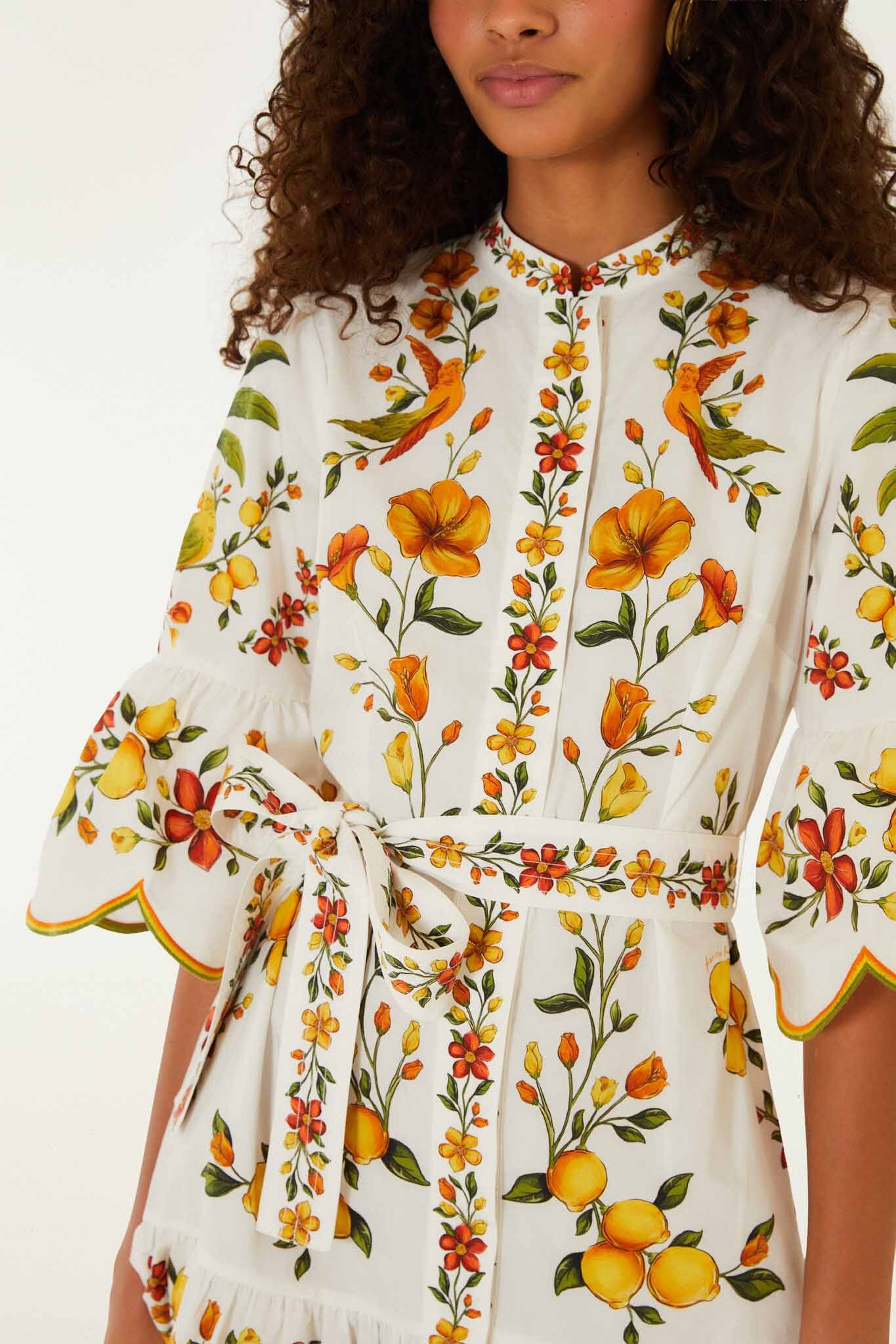 FARM Rio model wearing the Lemon Bouquet Off-White Mini Dress
