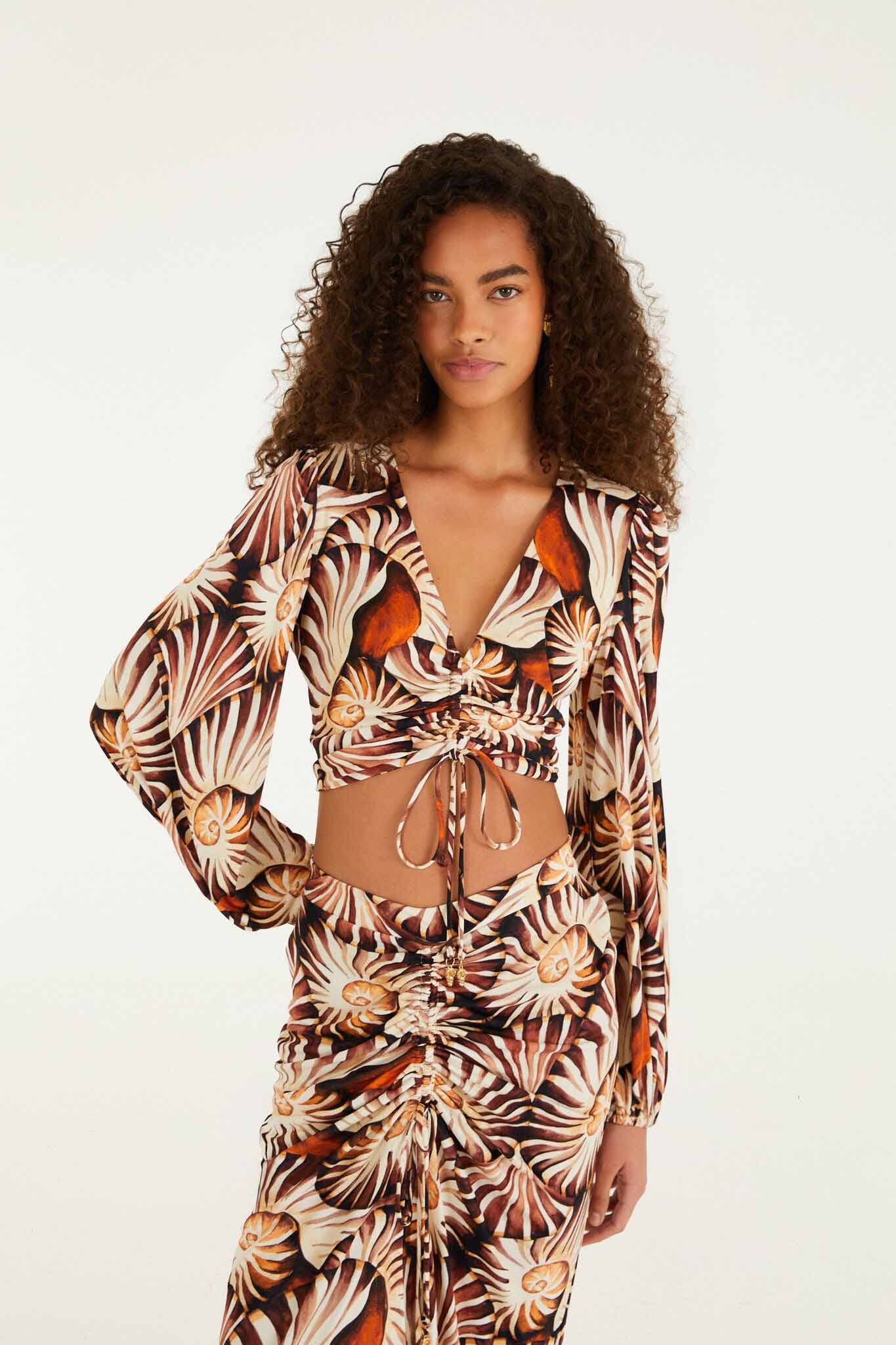 FARM Rio model wearing the Multicolor Ammonite Ruched Long Sleeve Crop Top