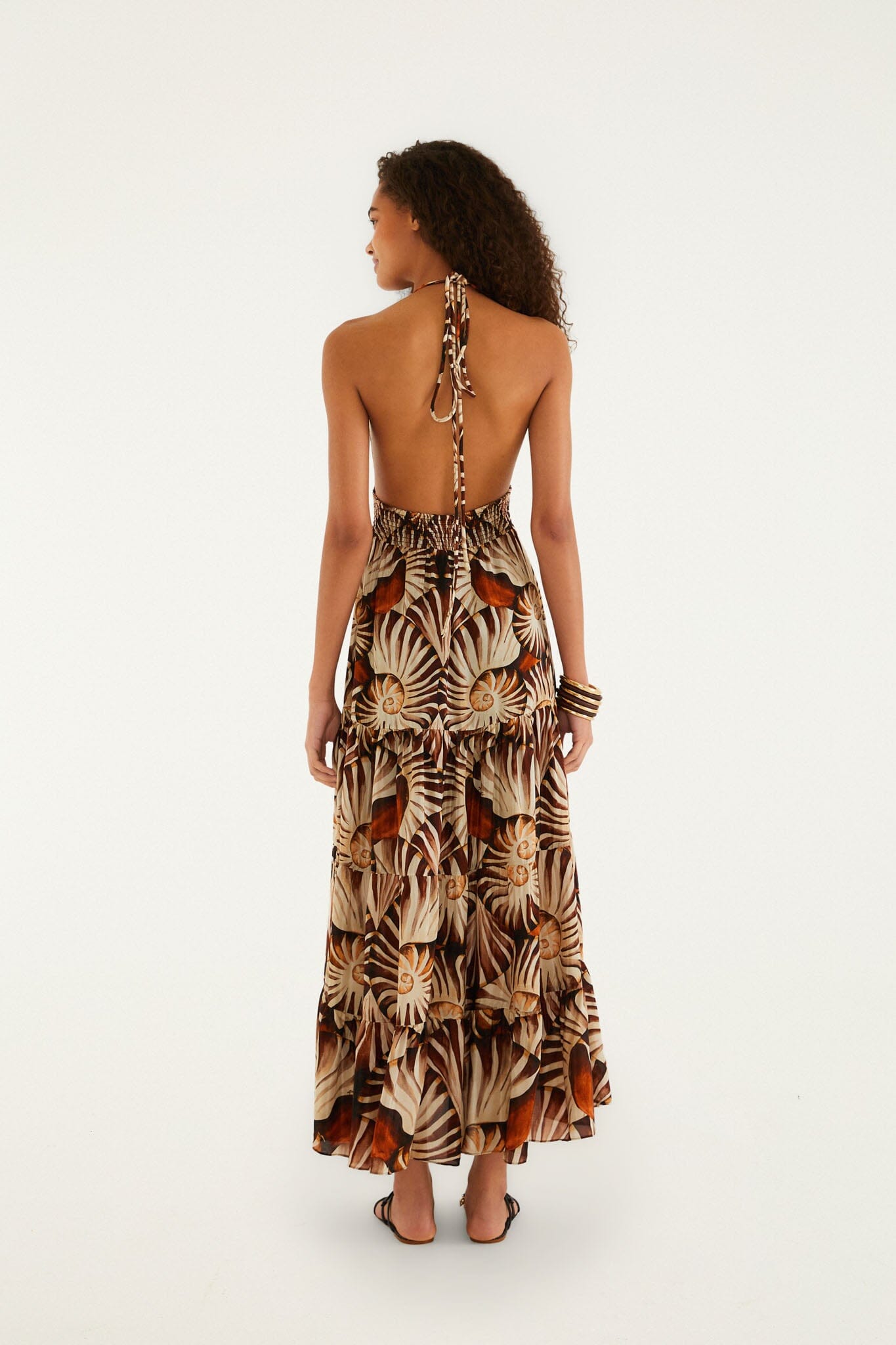 FARM Rio model wearing the Multicolor Ammonite Tassel Smocked Maxi Dress