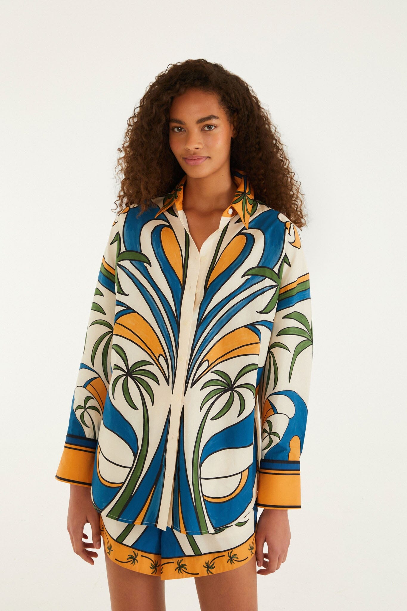 FARM Rio model wearing the Multicolor Tropical Graphic Collared Buttoned Shirt