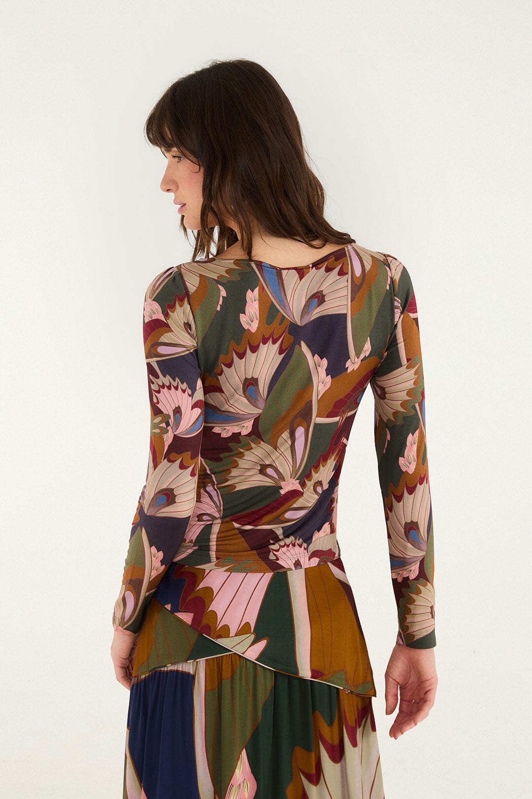FARM Rio model wearing the Mystical Paradise Fit Long Sleeve Blouse