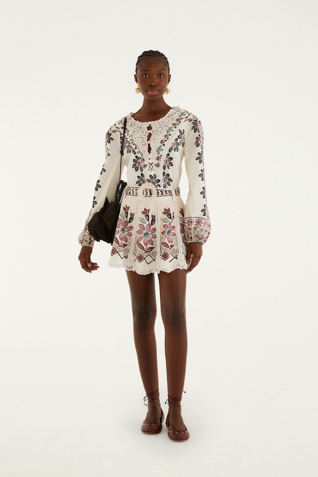 FARM Rio model wearing the Off-White Ainika Rustic Flowers Crochet Detail Mini Skirt