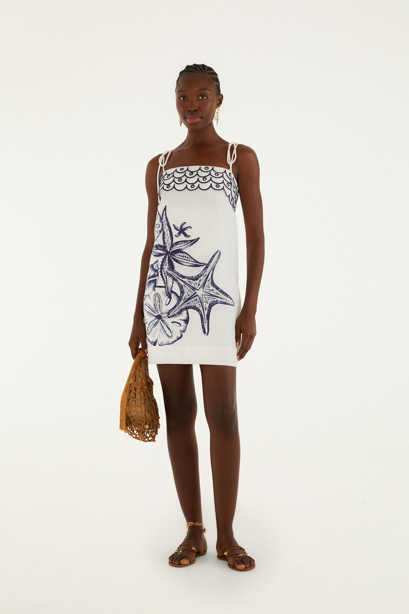 FARM Rio model wearing the Off-White Coast Stars Euroflax Premium Linen Mini Dress