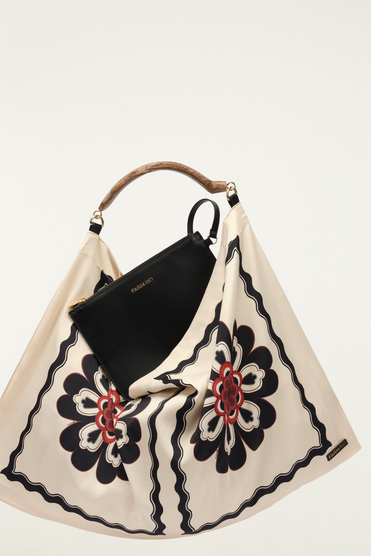 FARM Rio model wearing the Off-White Flowers Satin Medium Scarf Bag