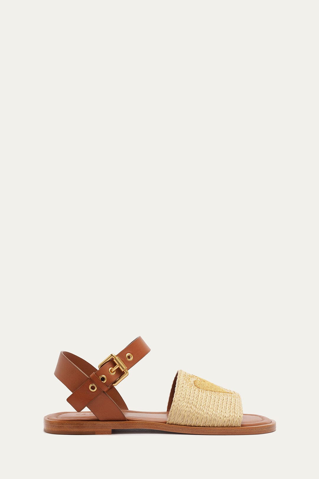 FARM Rio model wearing the Raffia Flat Sandal