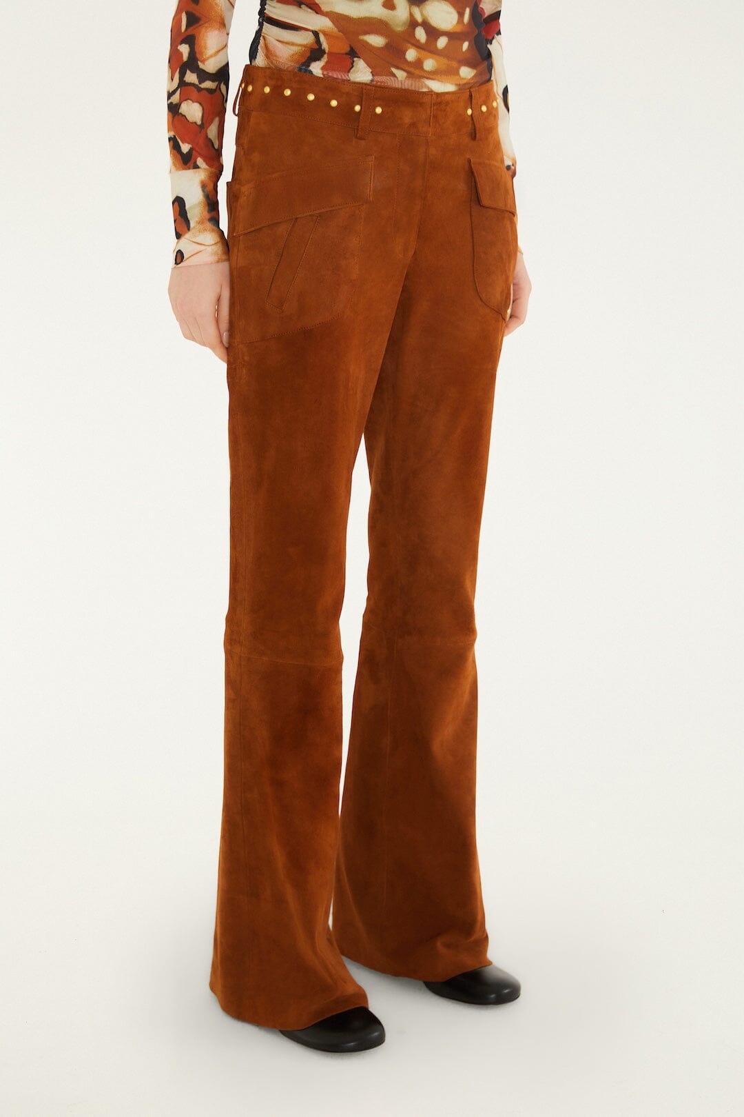 FARM Rio model wearing the Riveted Flare Leather Trousers